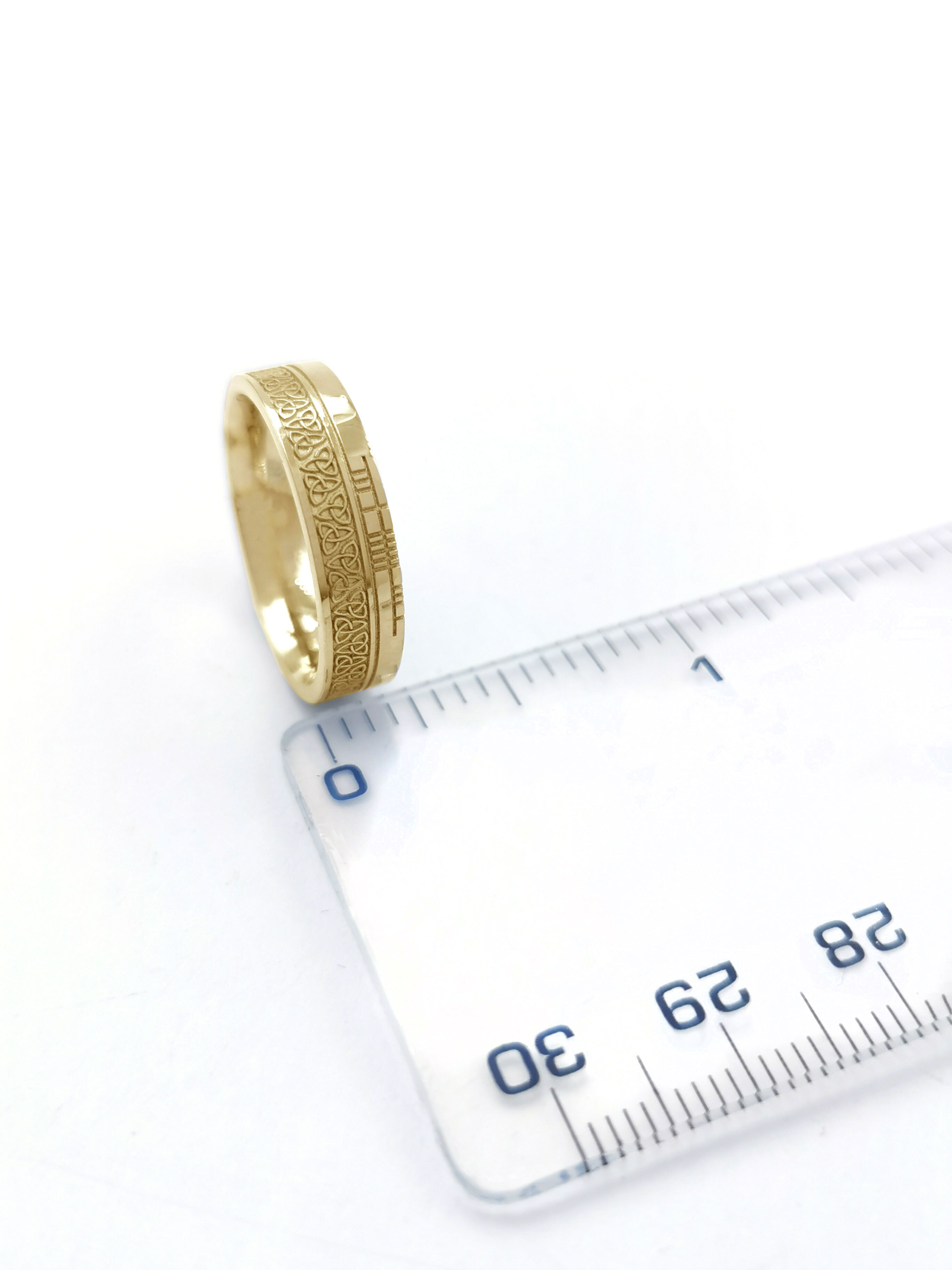 Authentic Yellow Gold Ogham & Trinity Knot 7.3mm Ring With a Florentine Finish. Picture For Scale.