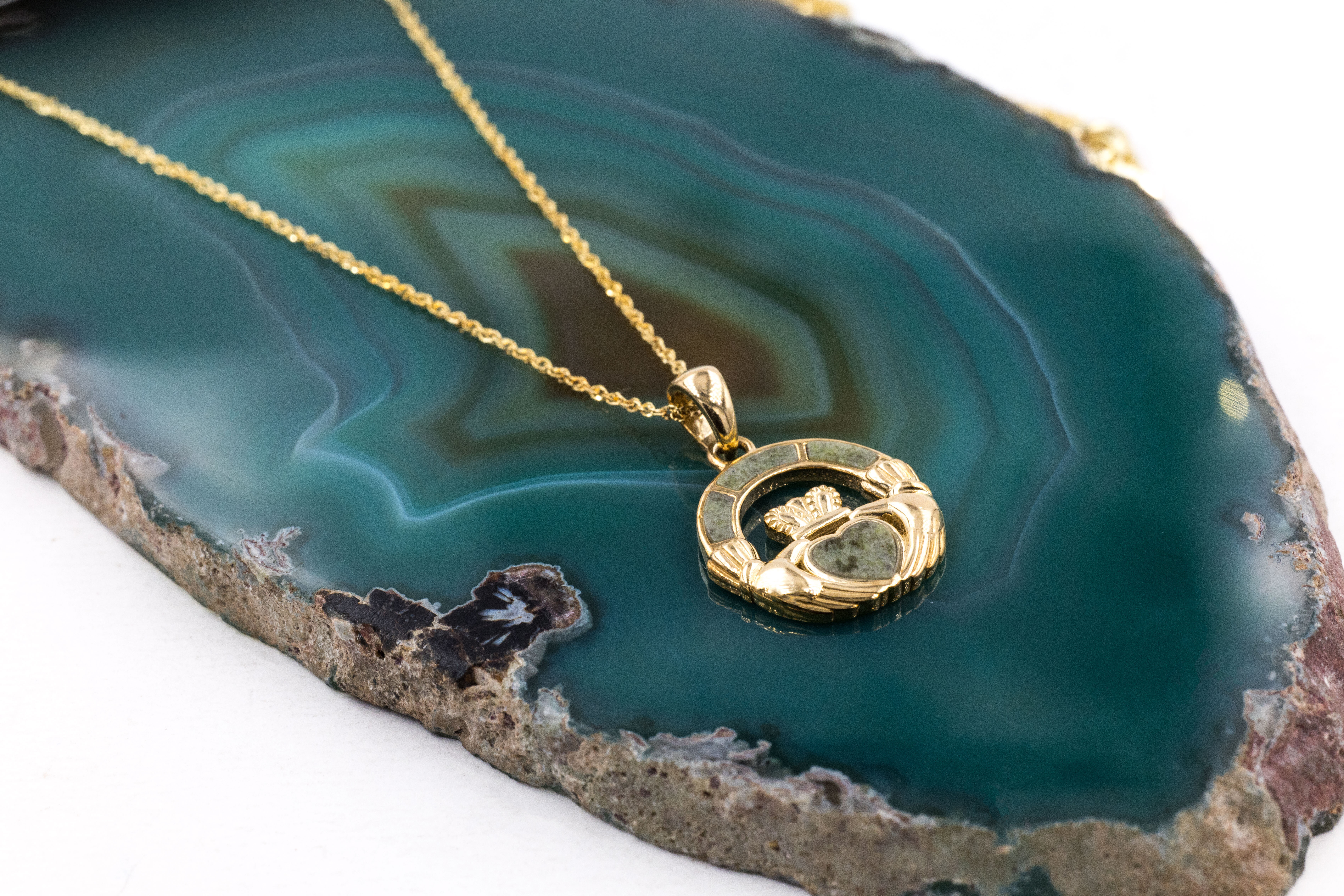 Striking Yellow Gold Connemara Marble Necklace For Women. Pictured Flat.