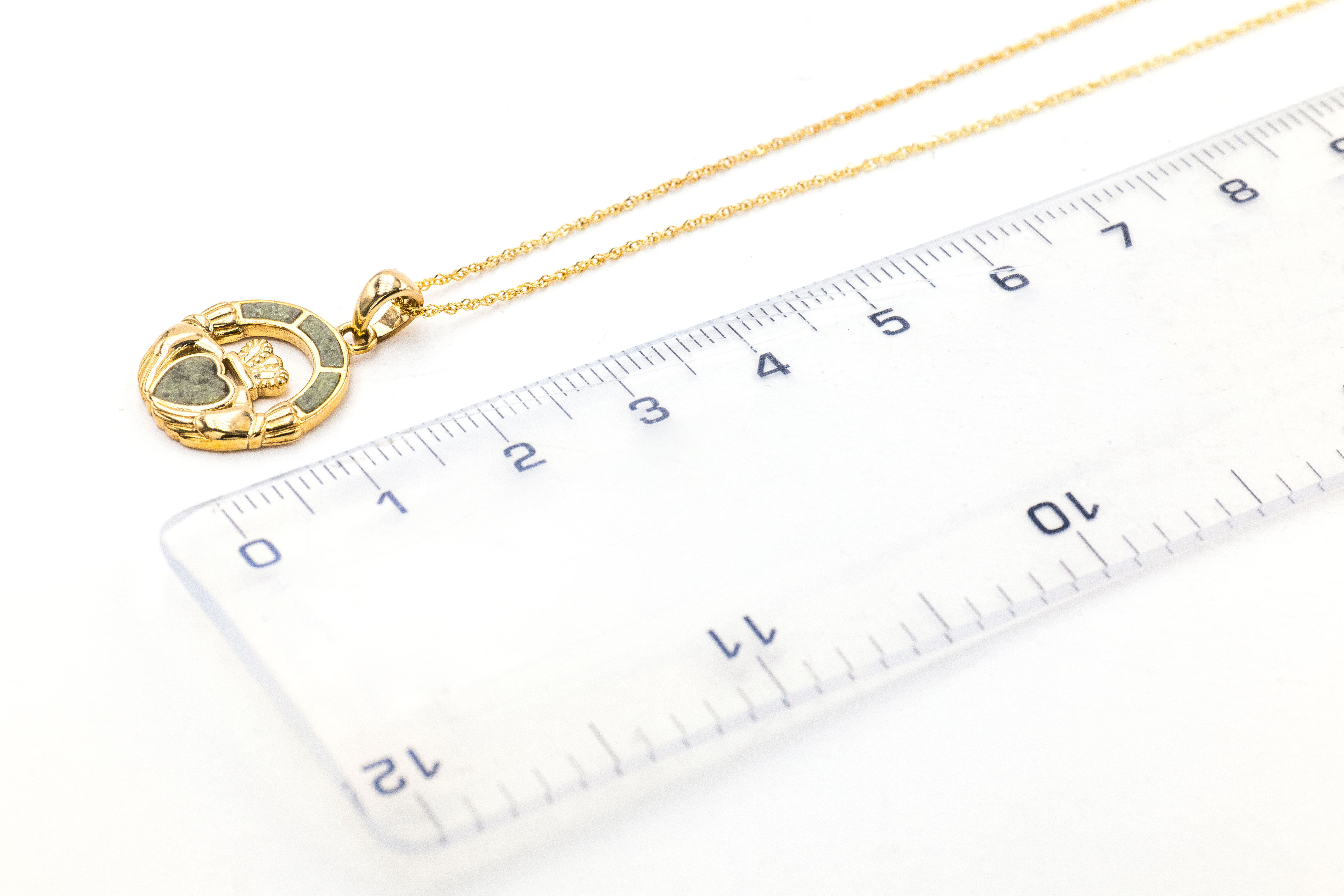 Genuine Yellow Gold Connemara Marble & Claddagh Necklace For Women. Picture For Scale.