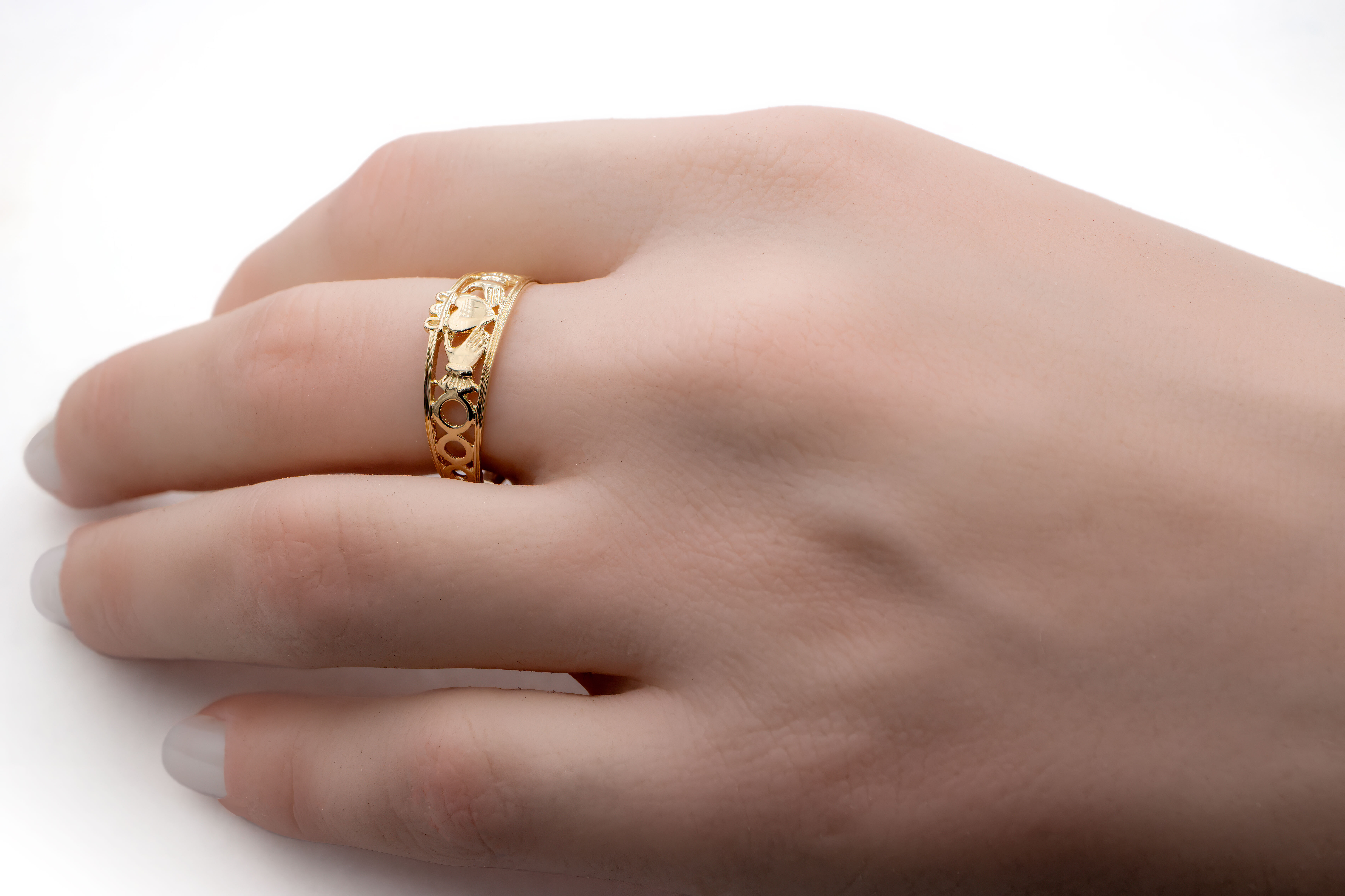 Womens Authentic 9K Yellow Gold Claddagh Ring - Model Photo