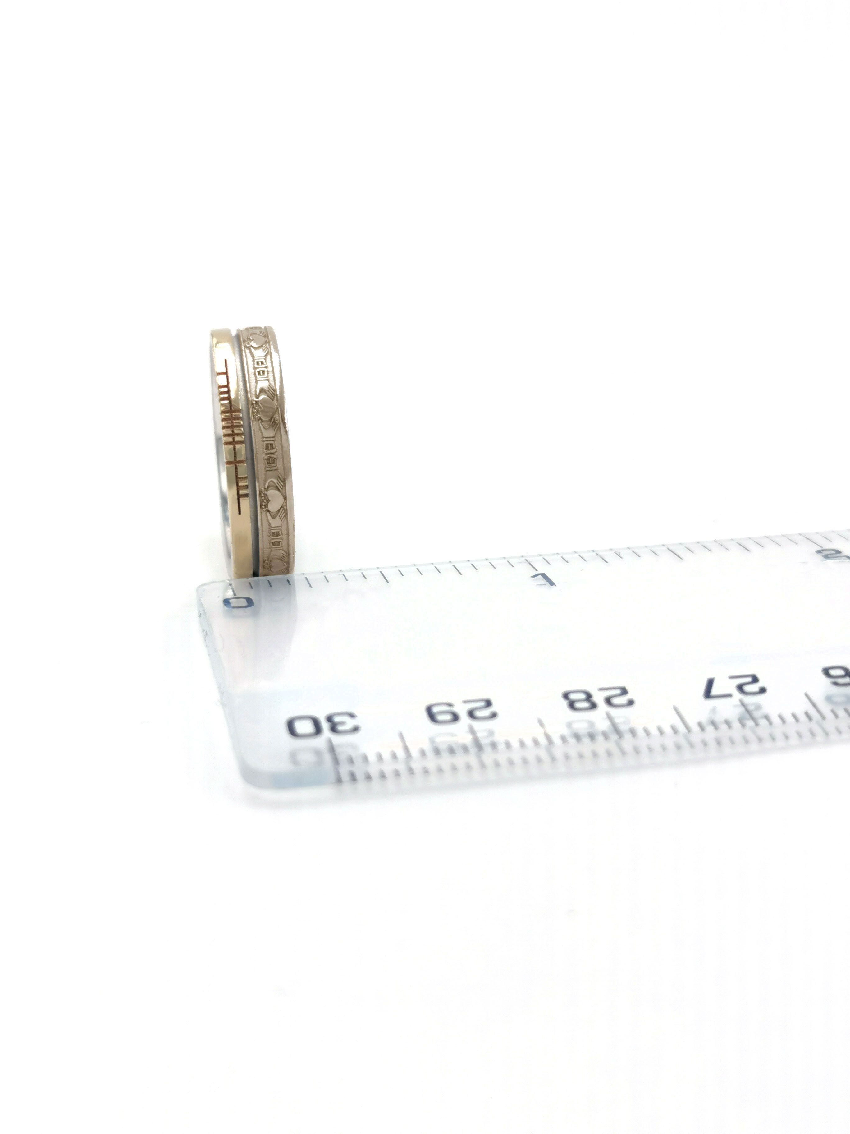 Florentine Yellow Gold Ogham & Claddagh 5.2mm Ring. Picture For Scale.