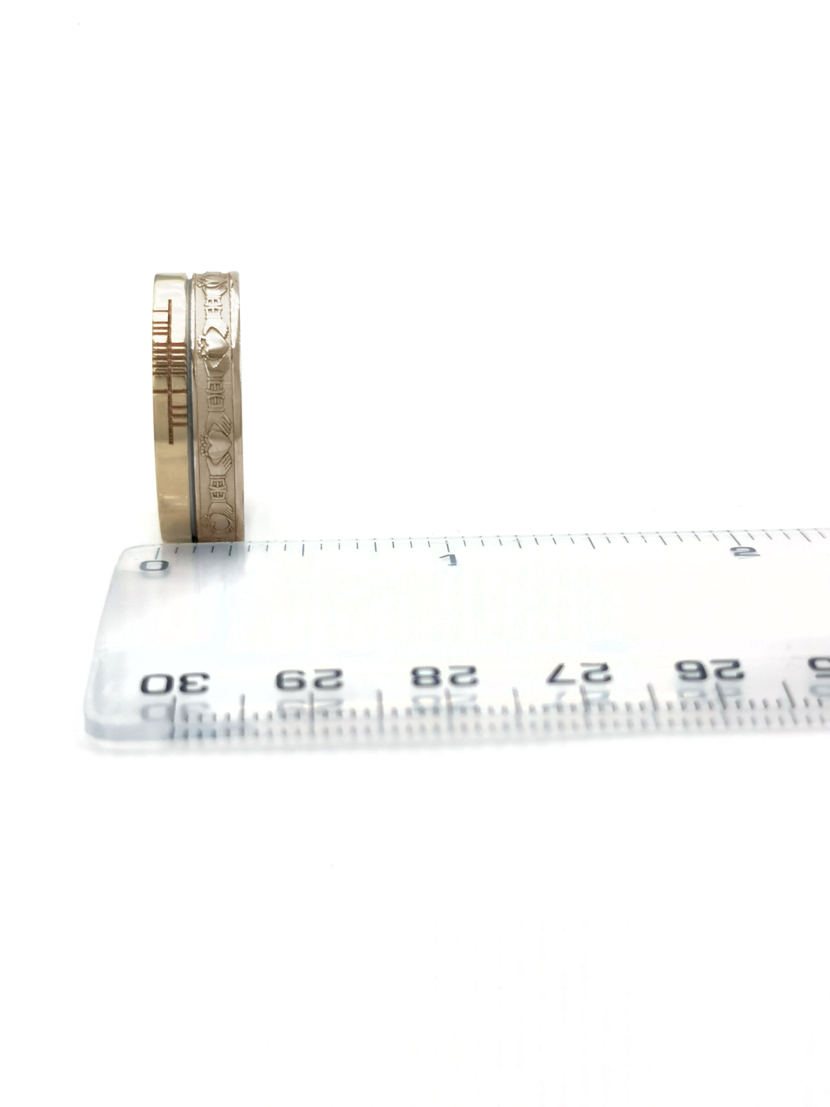 Ogham 7.3mm Ring in Yellow Gold With a Florentine Finish. Picture For Scale.