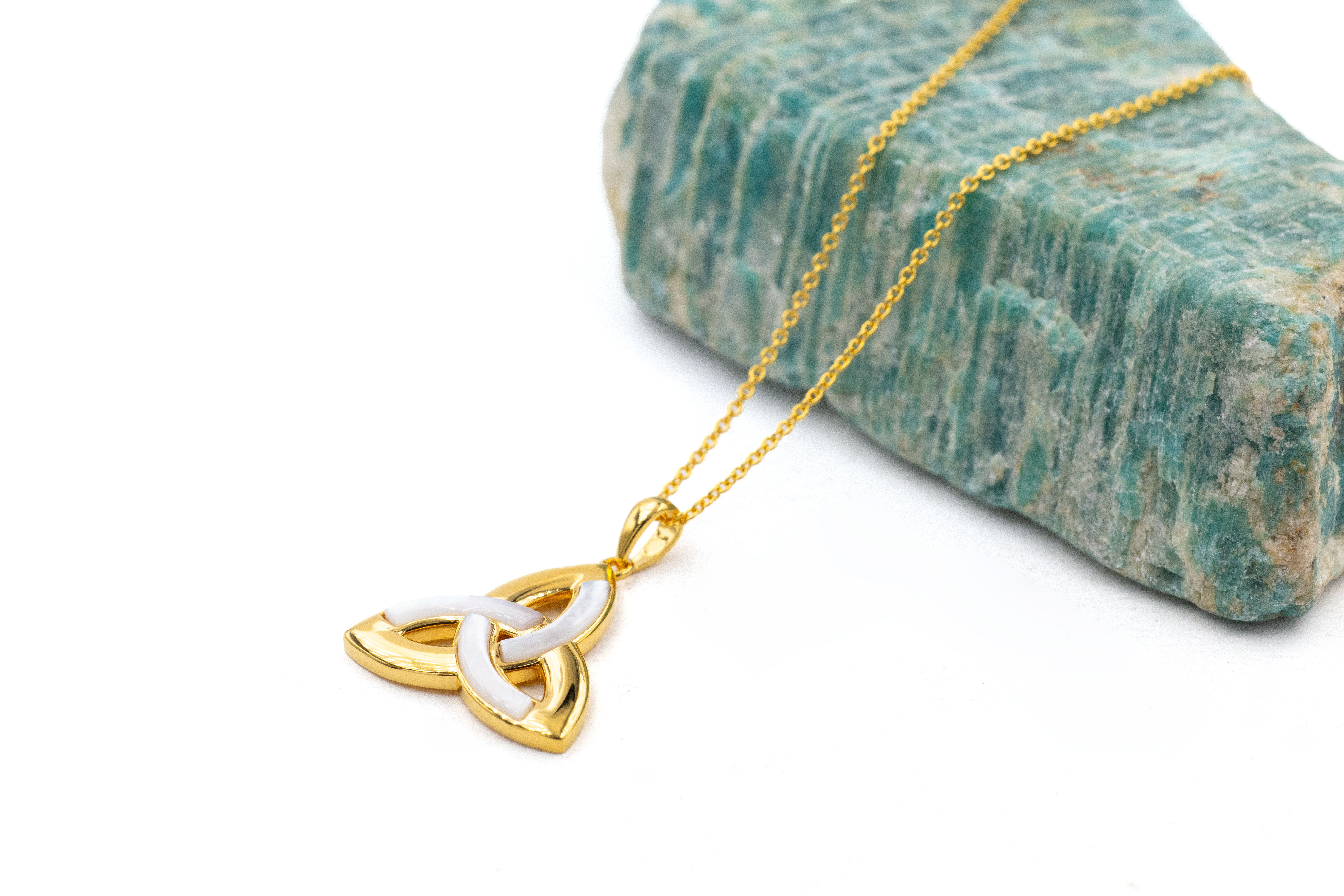 Womens Trinity Knot Necklace in Gold Vermeil. Pictured Flat.