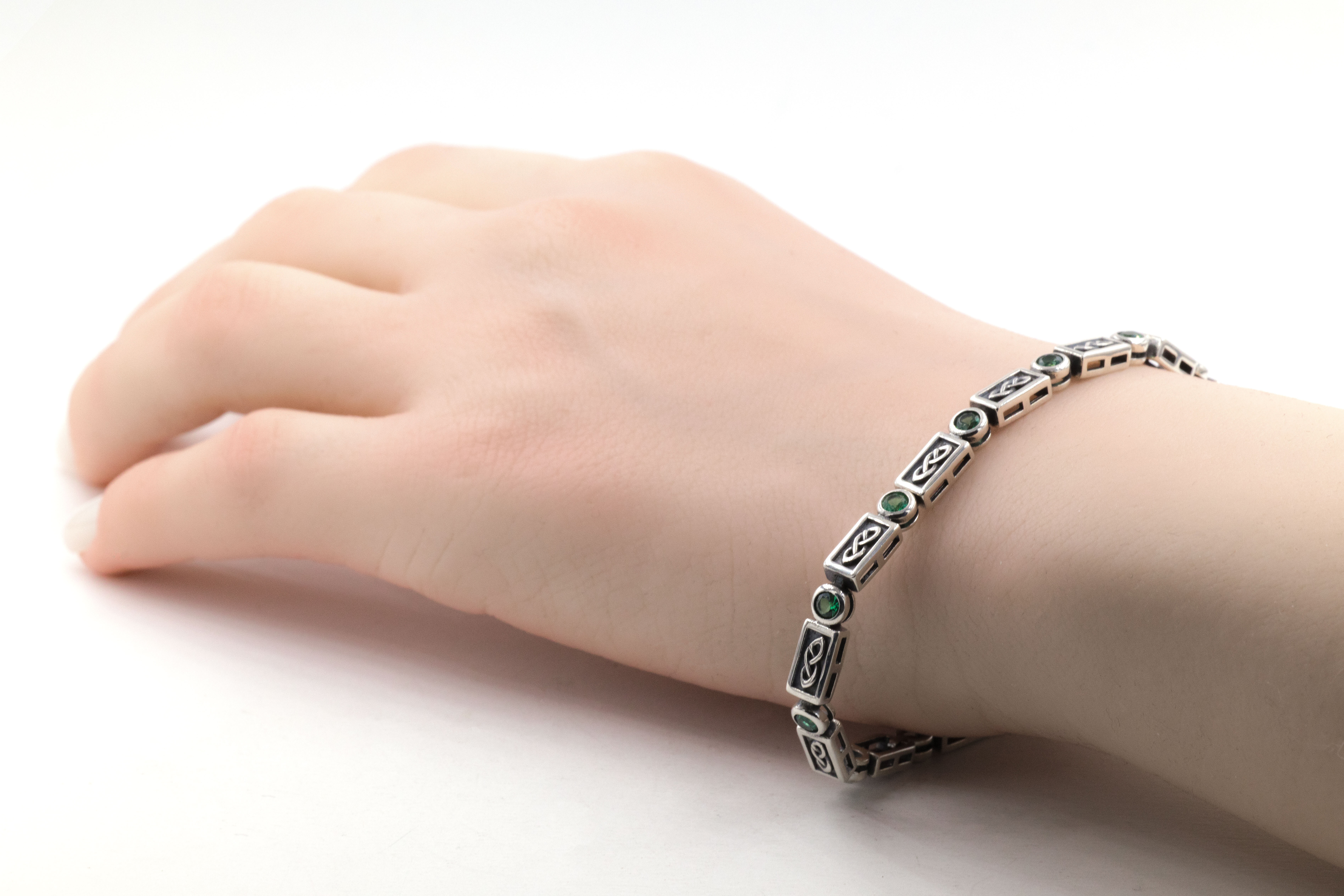 Authentic Sterling Silver Celtic Knot Bracelet For Women With a Oxidized Finish - Model Photo
