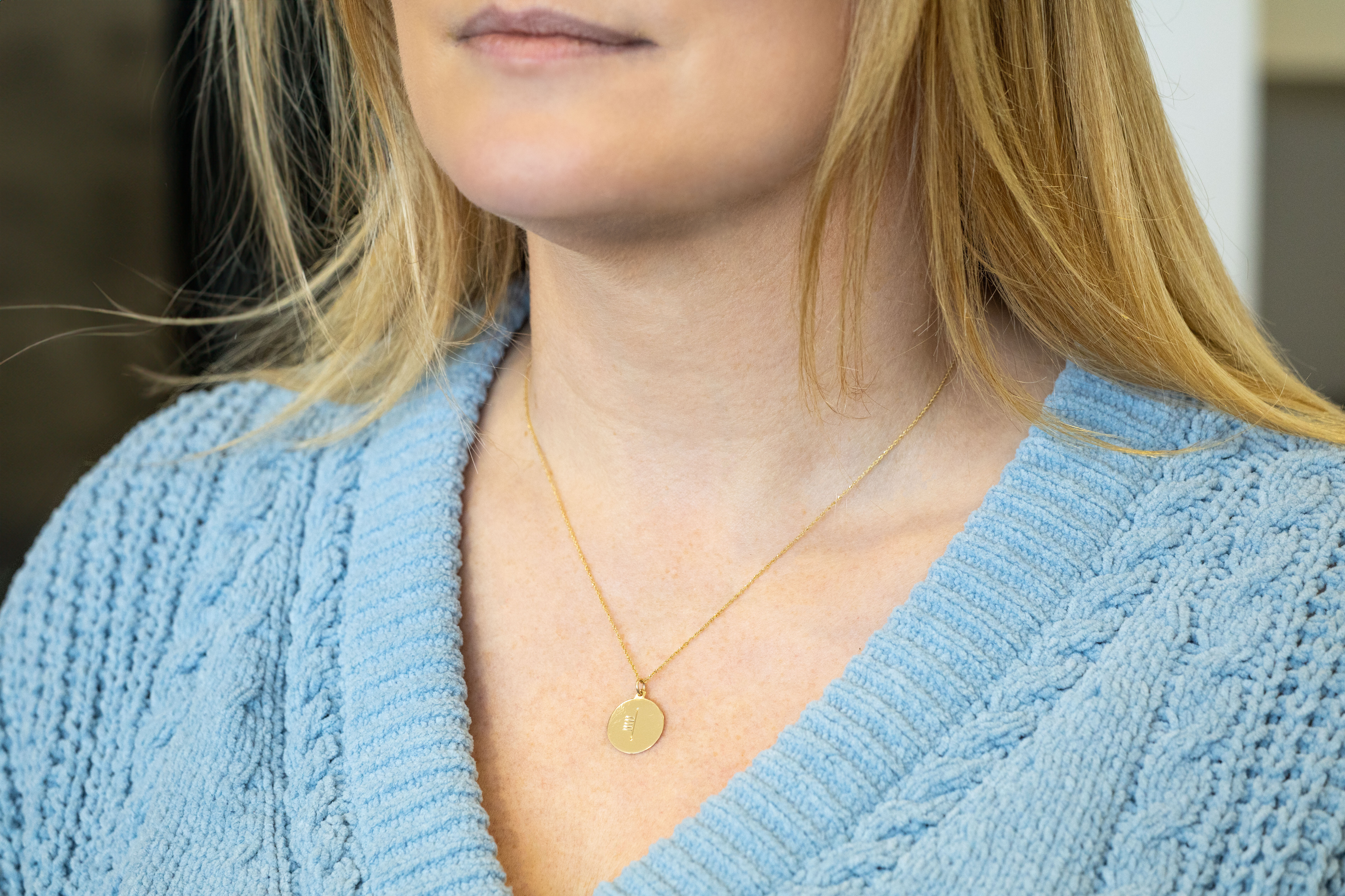 Irish 9K Yellow Gold Ogham Necklace With a Polished Finish - Model Photo