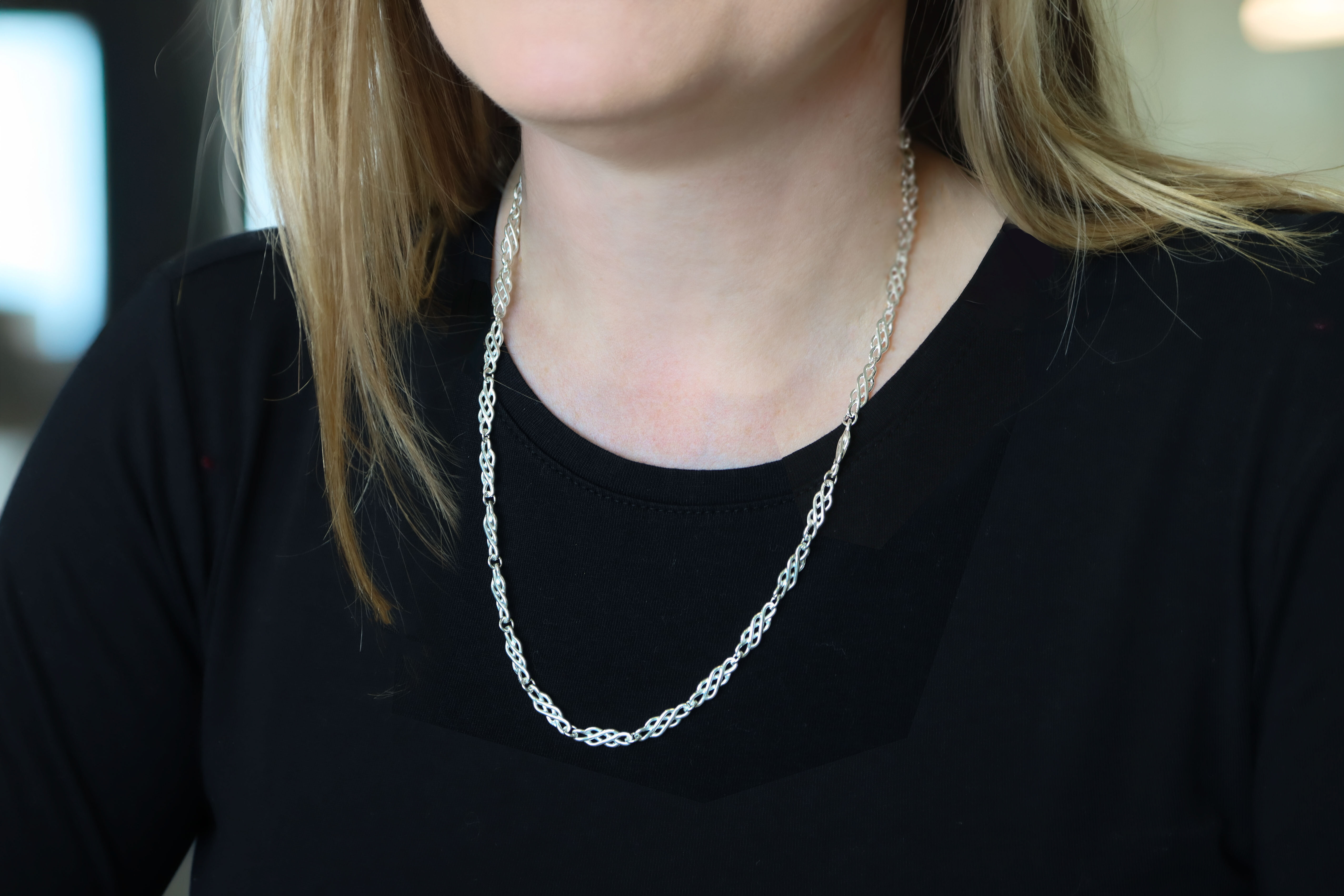 Womens Polished Sterling Silver Celtic Knot Necklace - Model Photo