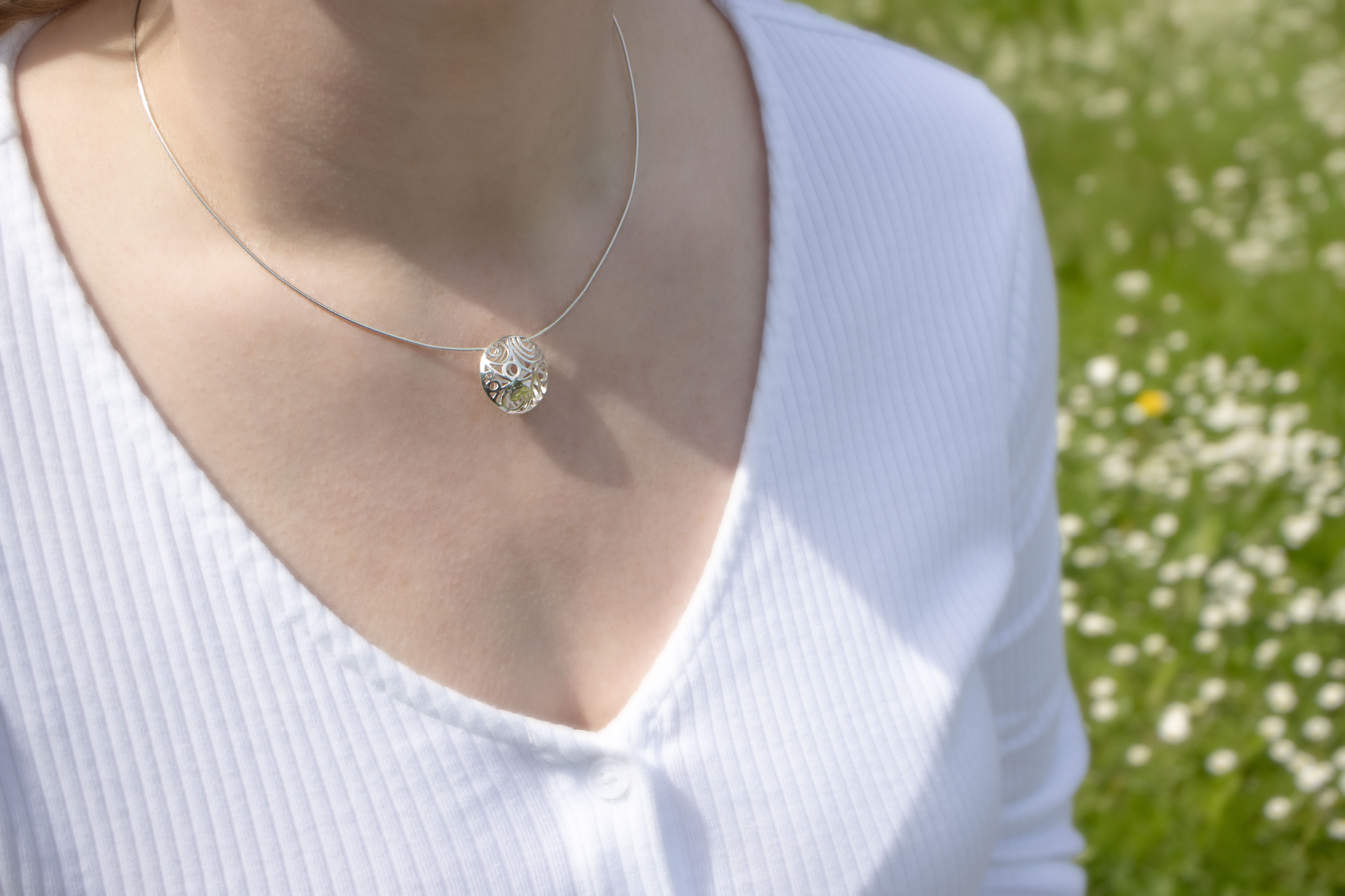 Genuine Sterling Silver Folklore & Newgrange Necklace For Women With a Polished Finish - Model Photo