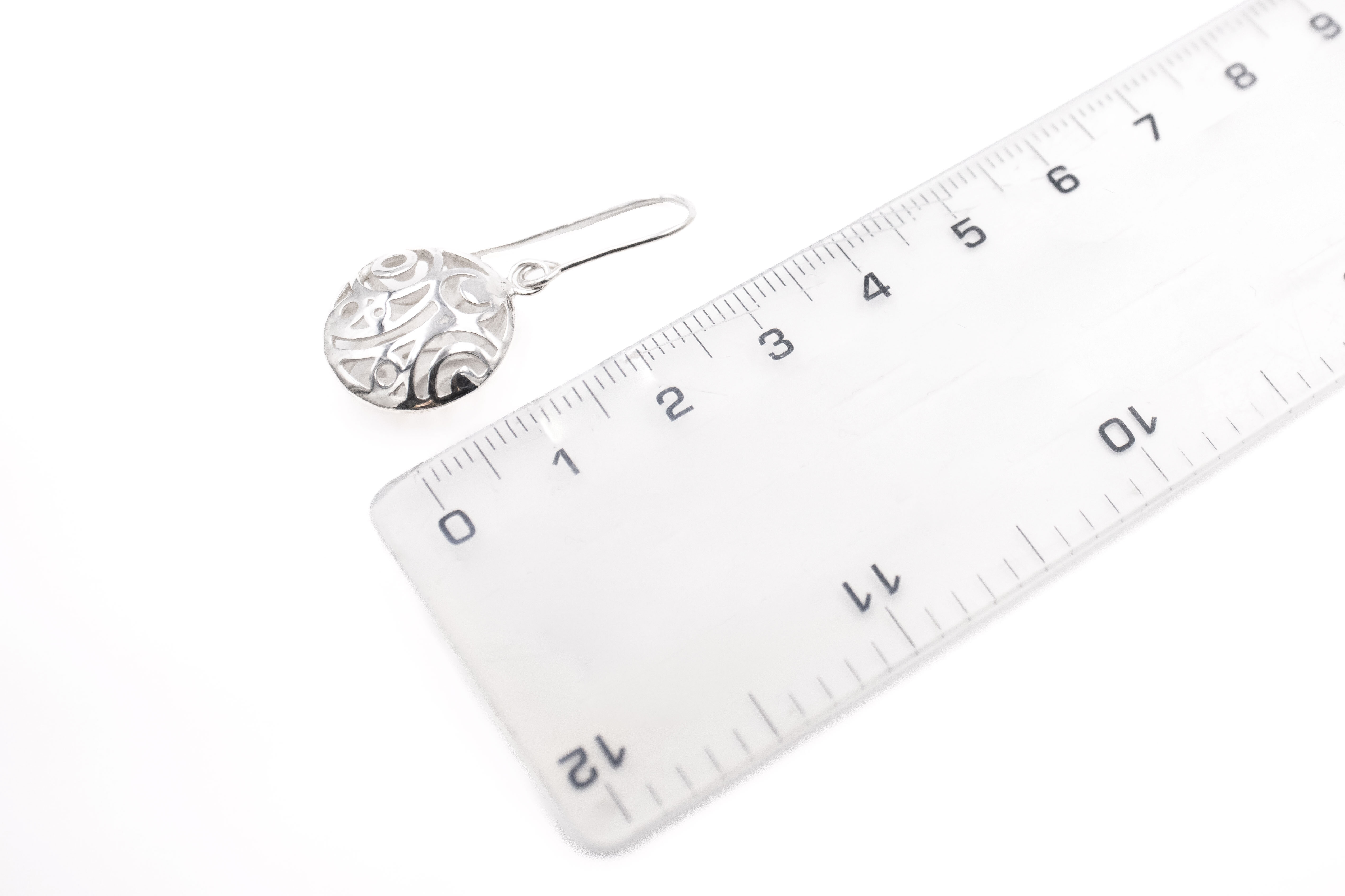 Womens Polished Sterling Silver Folklore Earrings. Picture For Scale.