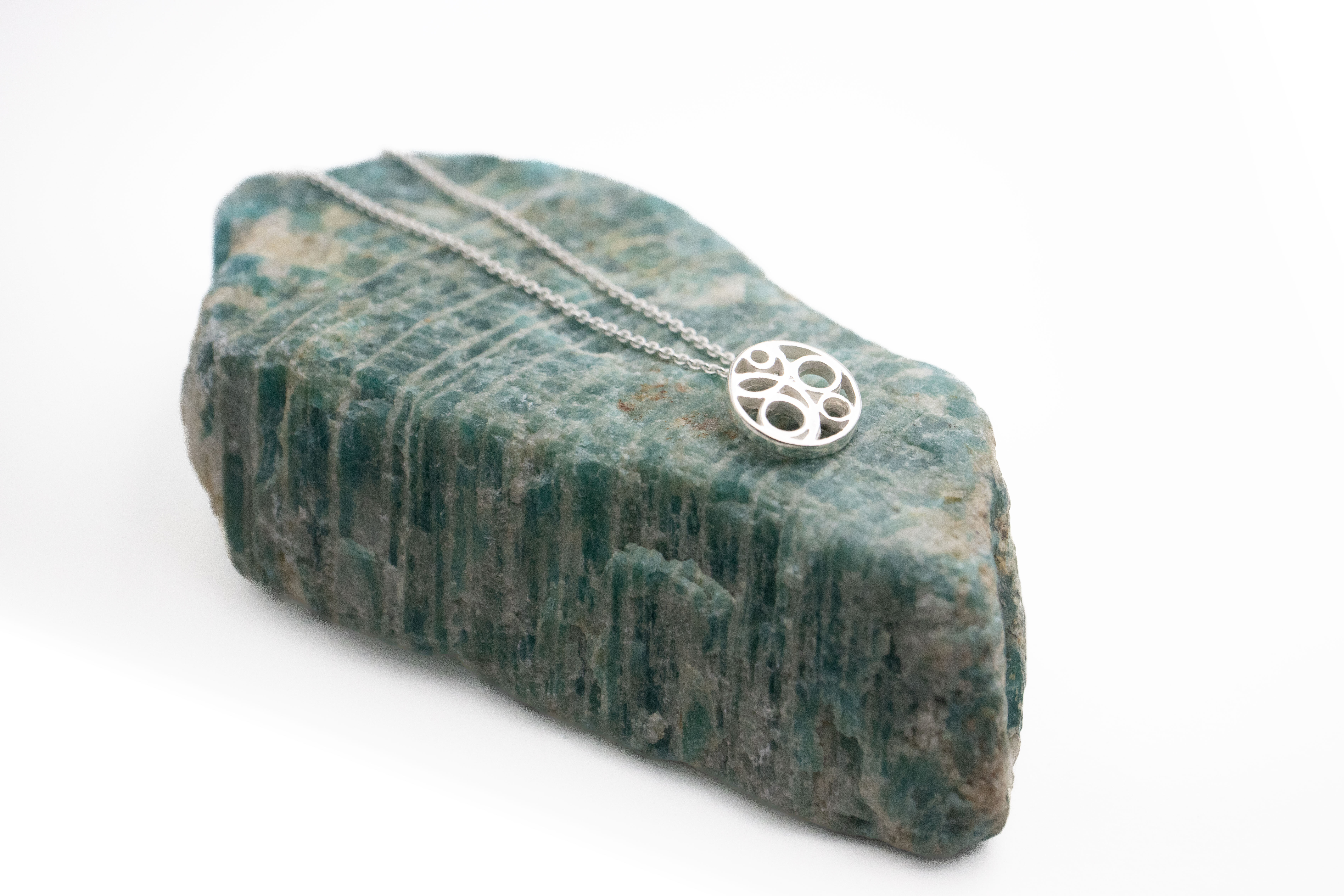 Womens Folklore & Triskele & Newgrange Gift Set in Sterling Silver With a Polished Finish. Pictured Flat.
