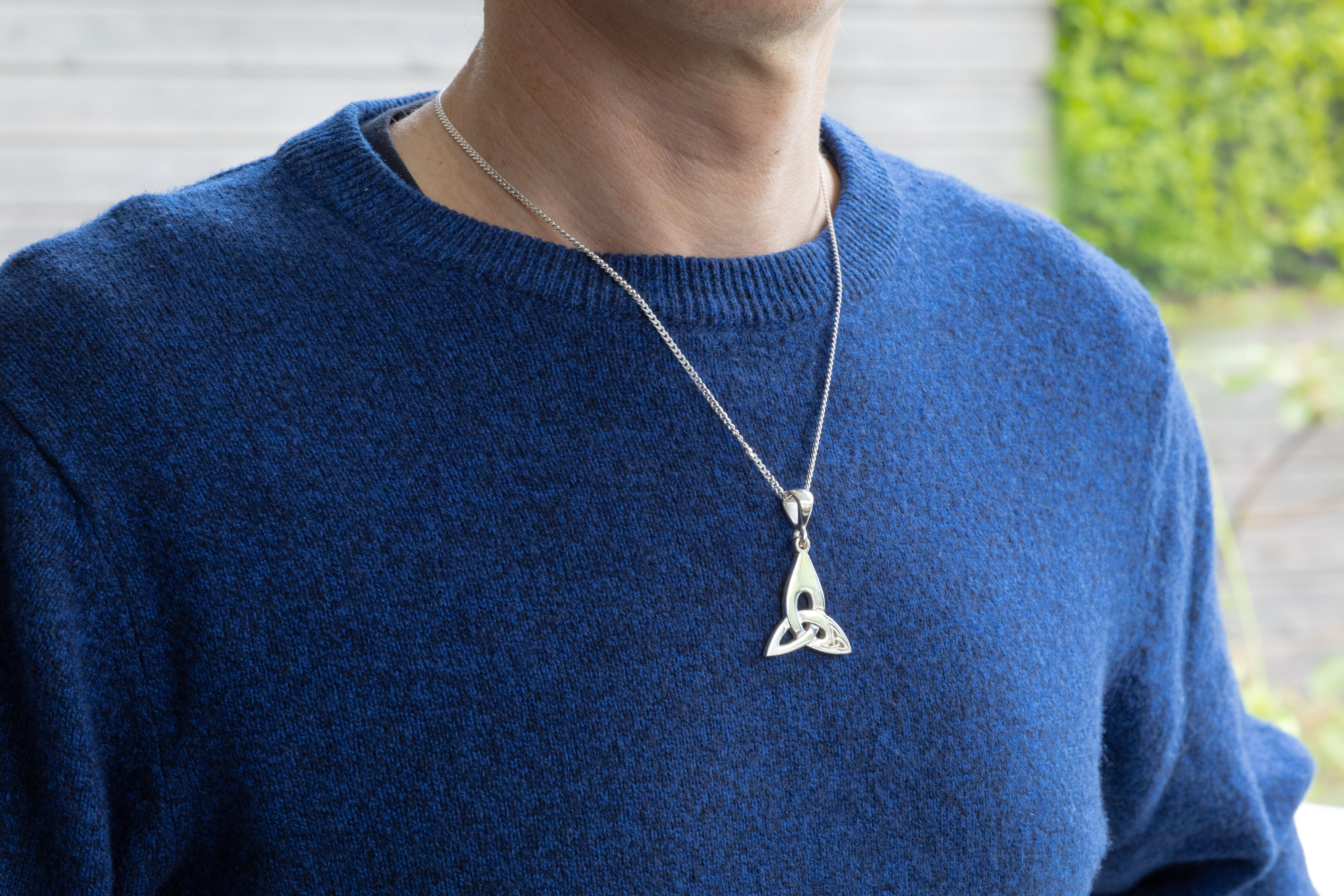 Striking Sterling Silver Trinity Knot Necklace With a Polished Finish - Model Photo