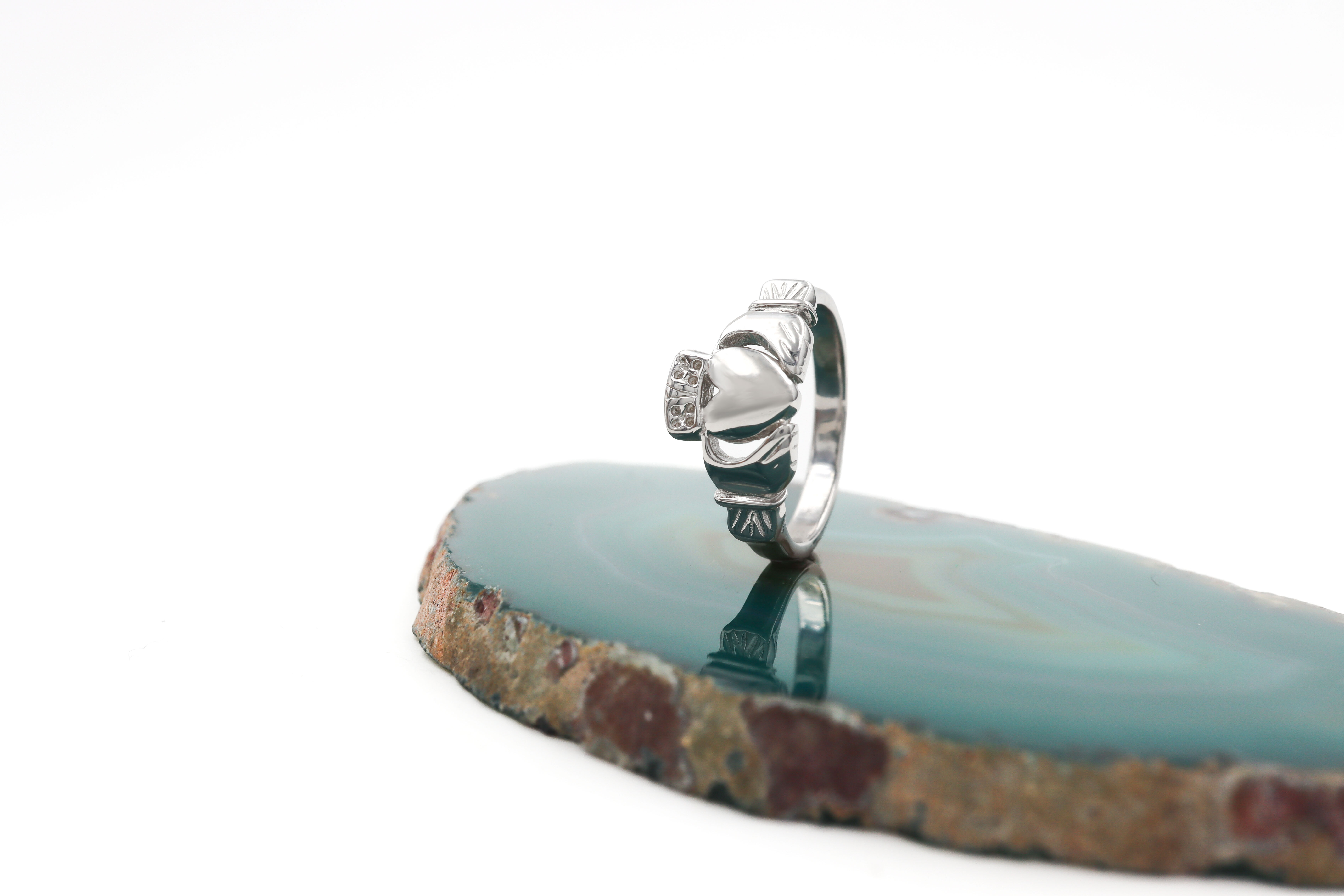 Irish Sterling Silver Claddagh Ring With a Polished Finish For Men. Side View.