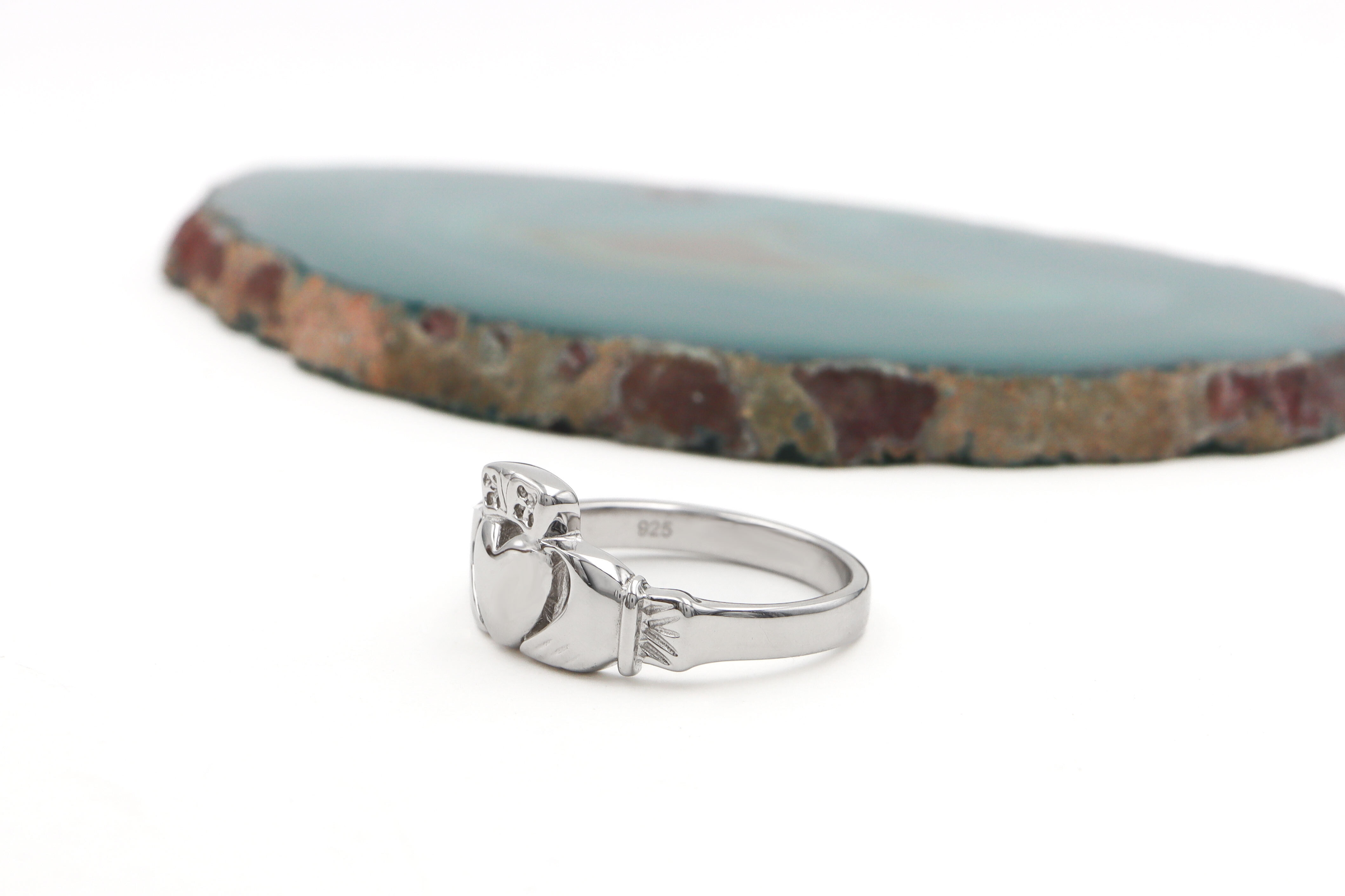 Heavy Sterling Silver Claddagh 11.4mm Ring With a Polished Finish For Men. Side View.
