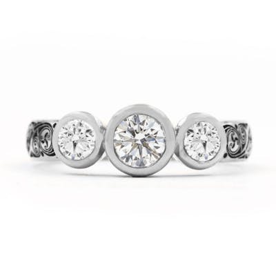 Three-Stone Bezel Set Diamond Triskele Ring