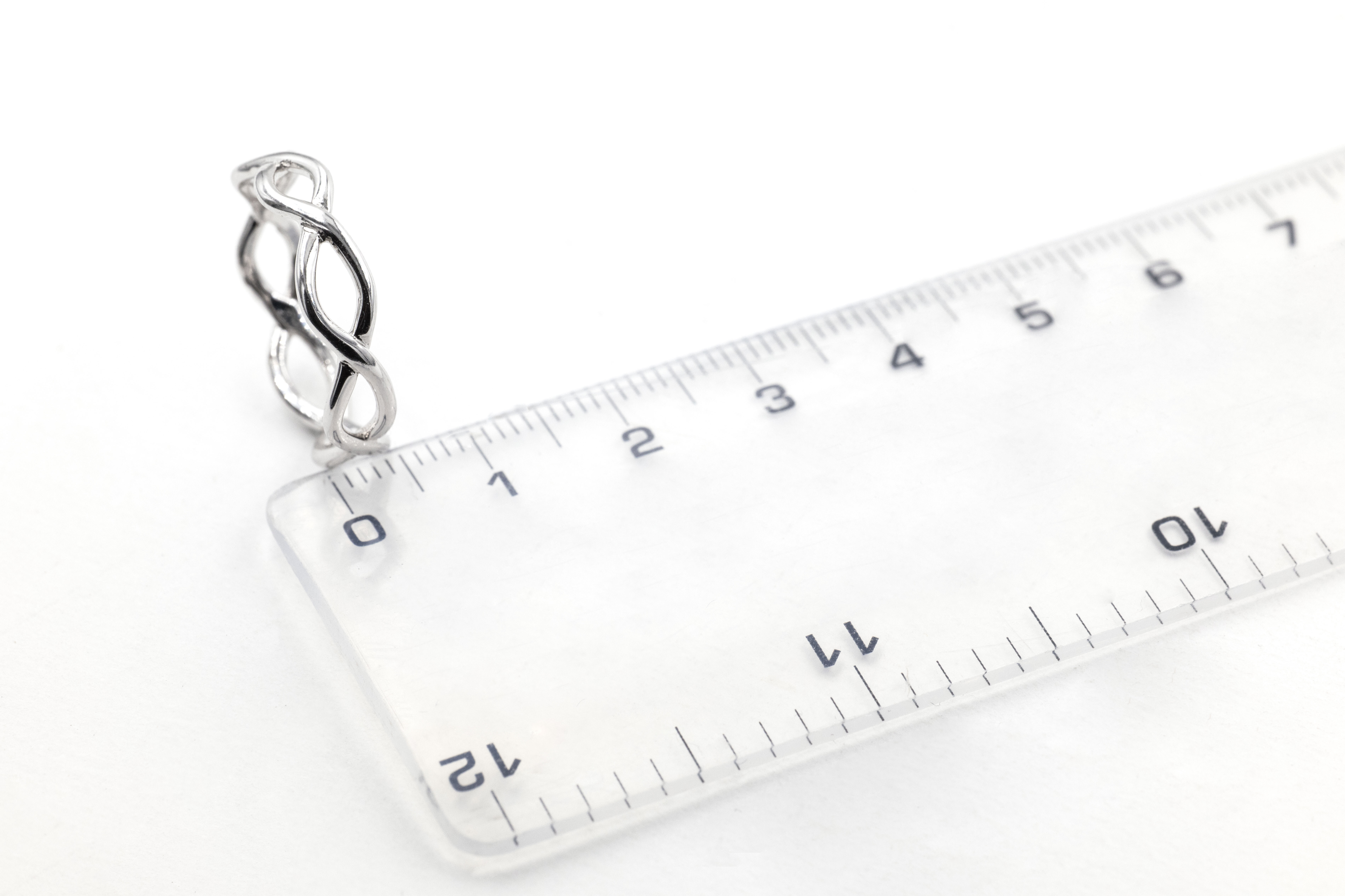 Womens Celtic Knot 6.0mm Ring in Real 10K White Gold. Picture For Scale.