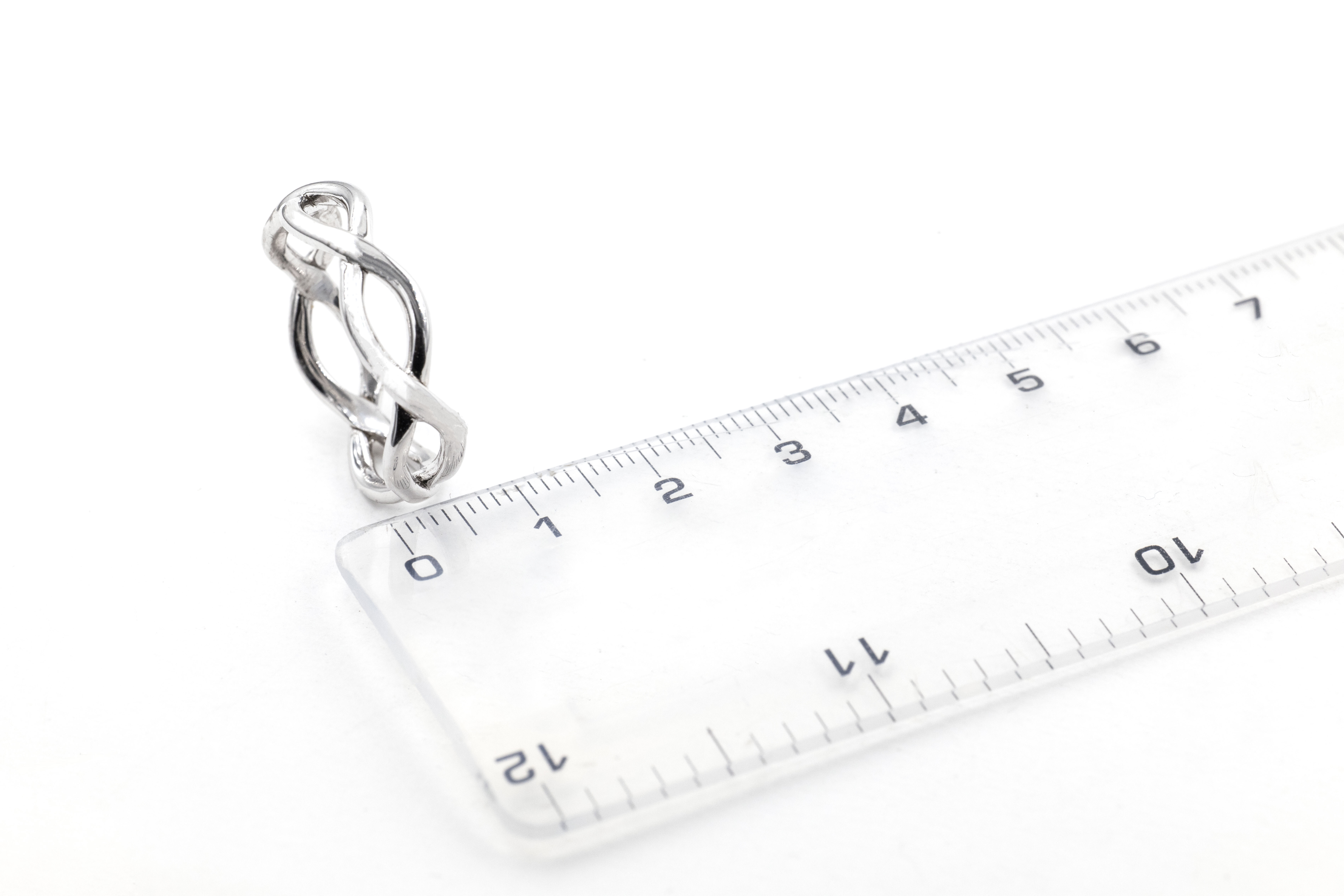 Attractive Sterling Silver Celtic Knot Ring For Men. Picture For Scale.