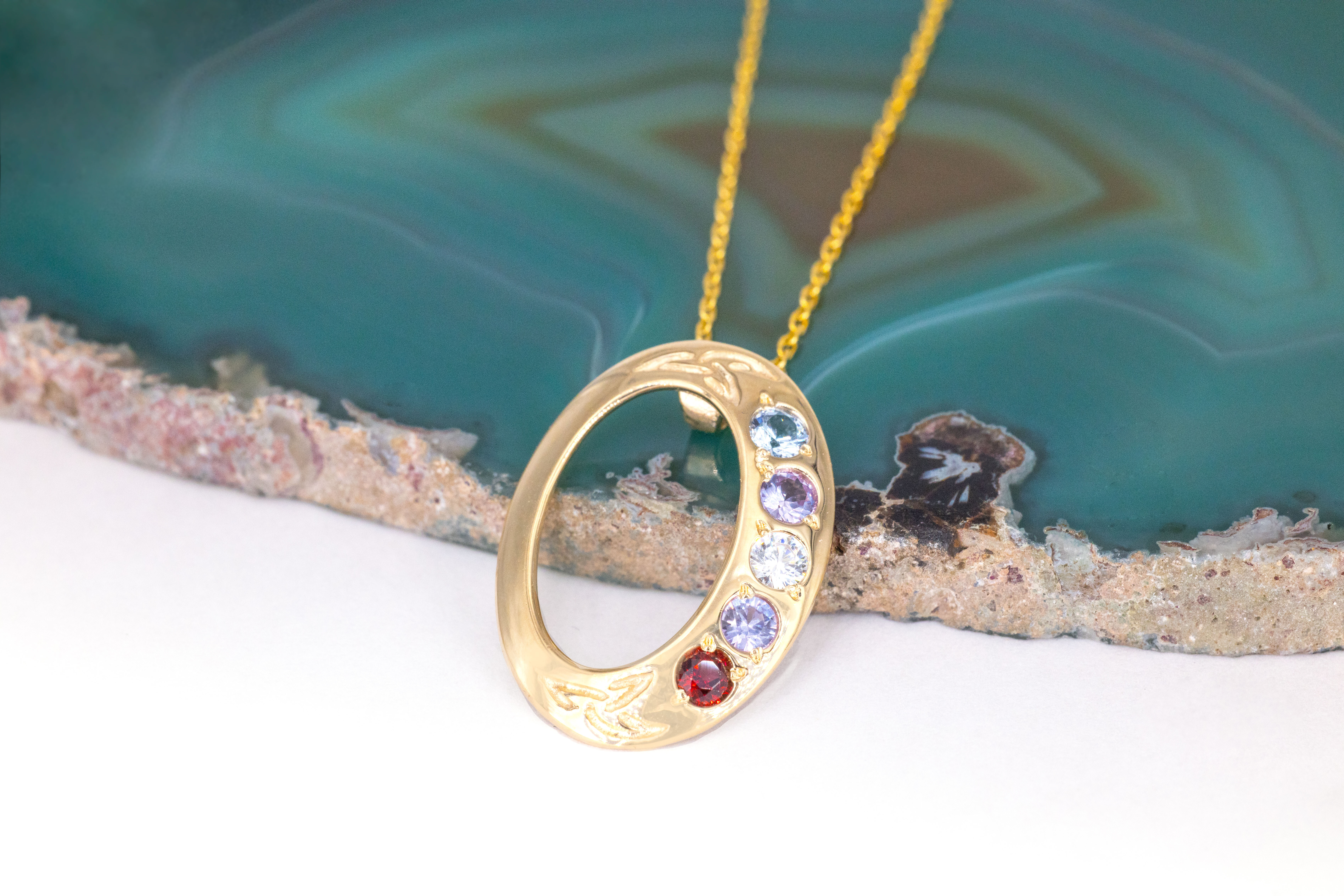 Gold Oval Trinity Knot Birthstone Pendant