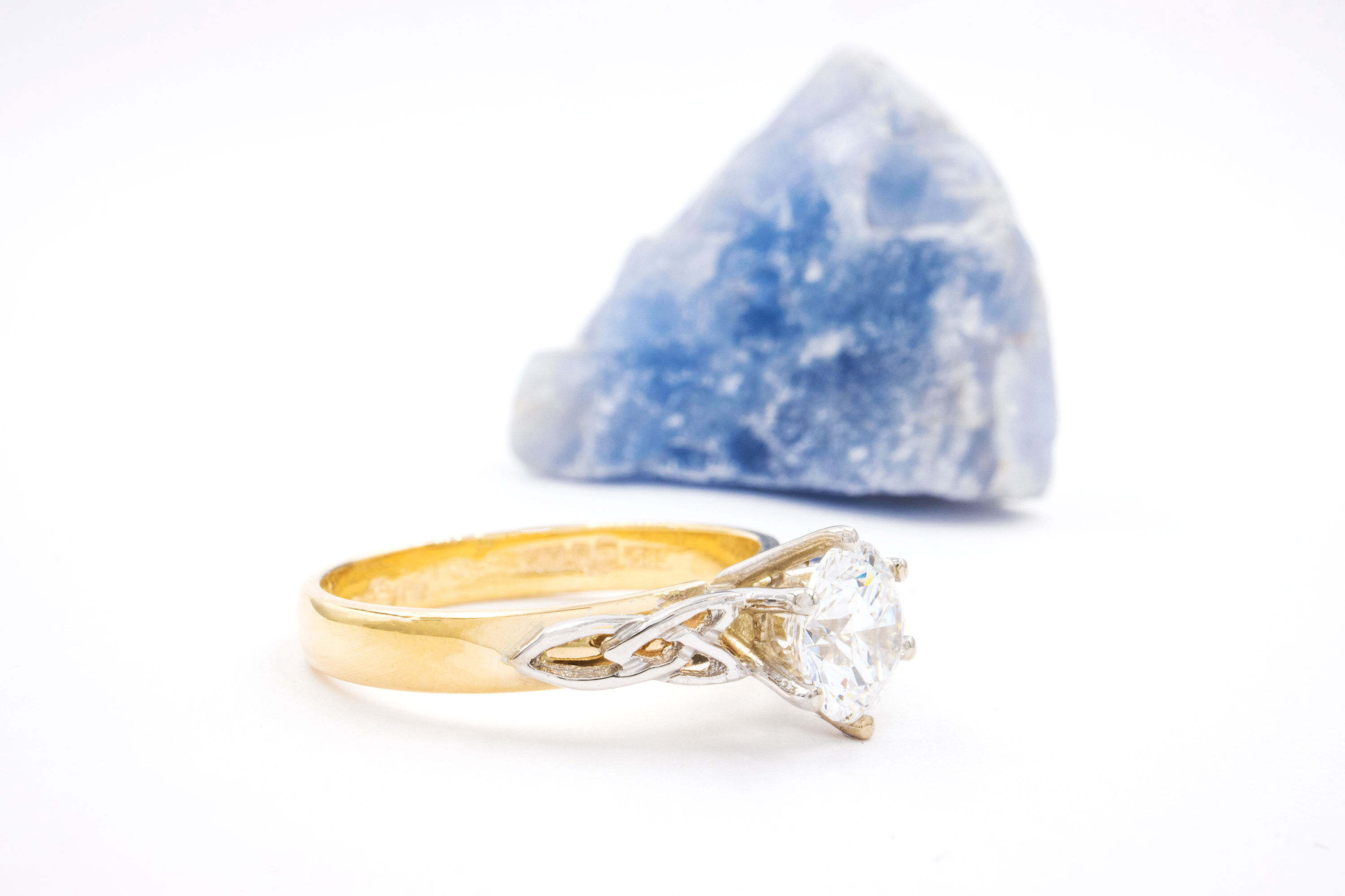 Luxurious 14K Yellow Gold & White Gold Trinity Knot Ring With a Polished Finish For Women