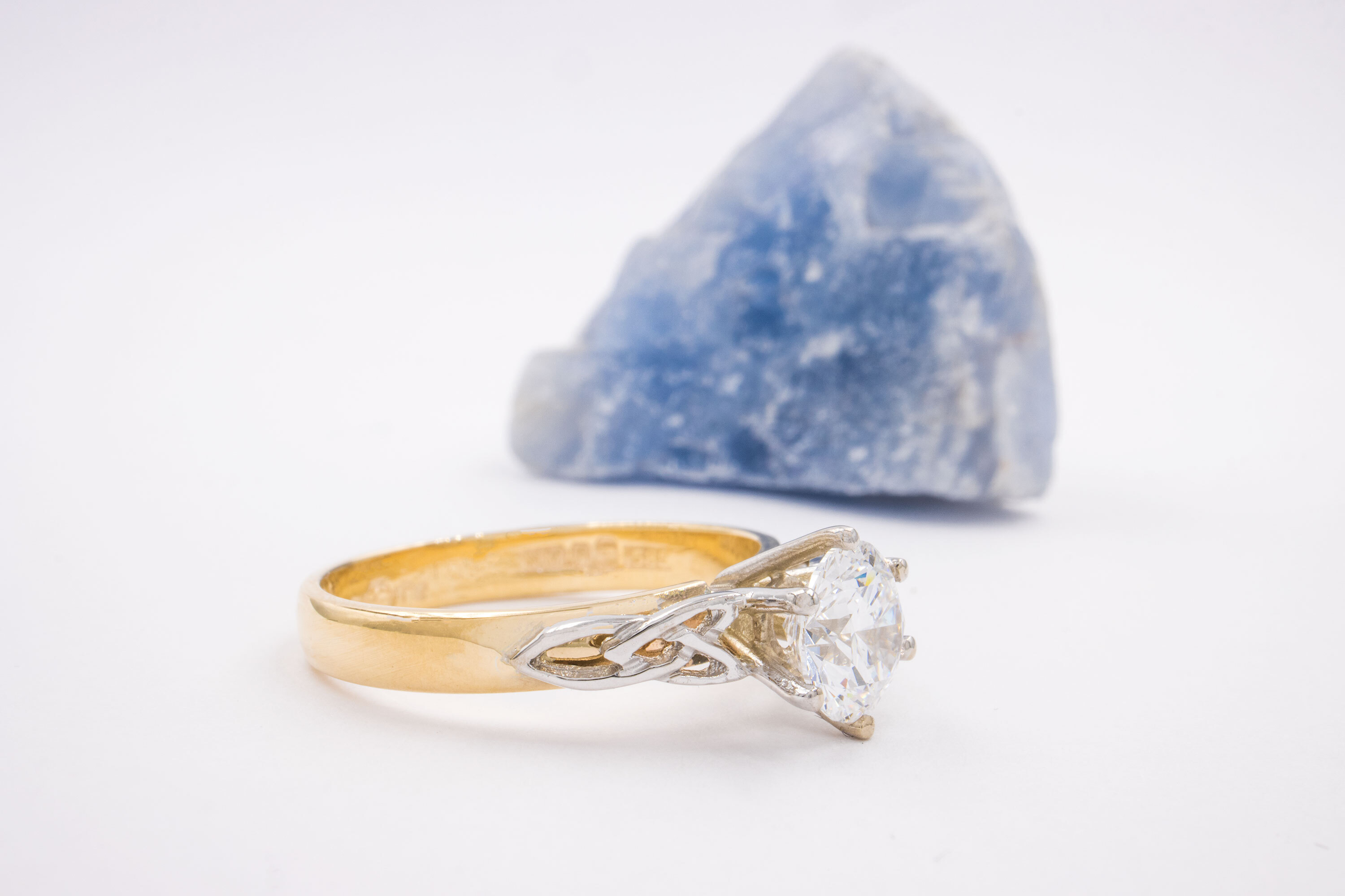 Womens Trinity Knot Engagement Ring in Yellow Gold & White Gold With a Polished Finish