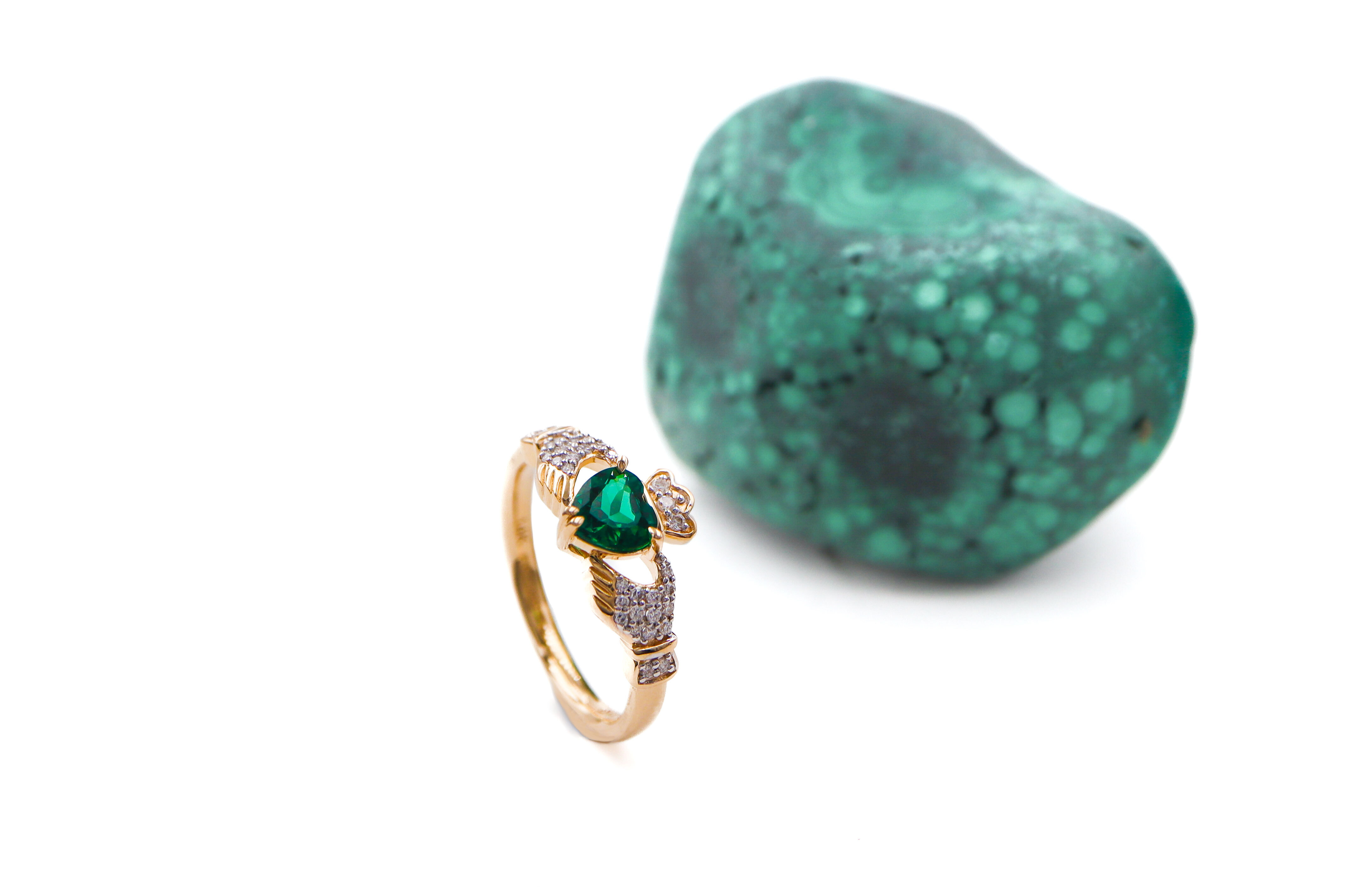 Real 14K Yellow Gold Claddagh Engagement Ring For Women With a Polished Finish. Side View.