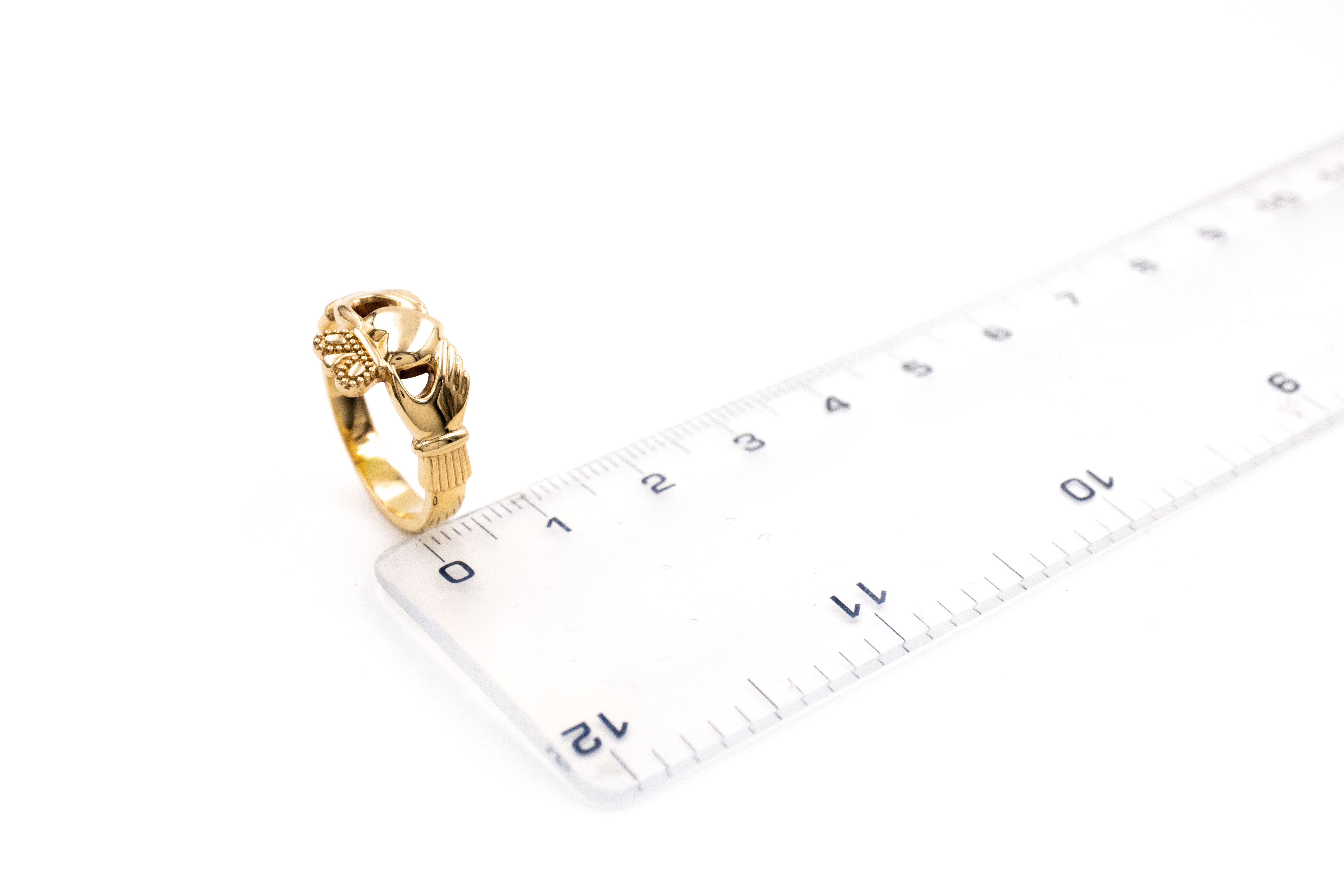 Womens Claddagh 2.0mm Ring in Real Yellow Gold. Picture For Scale.