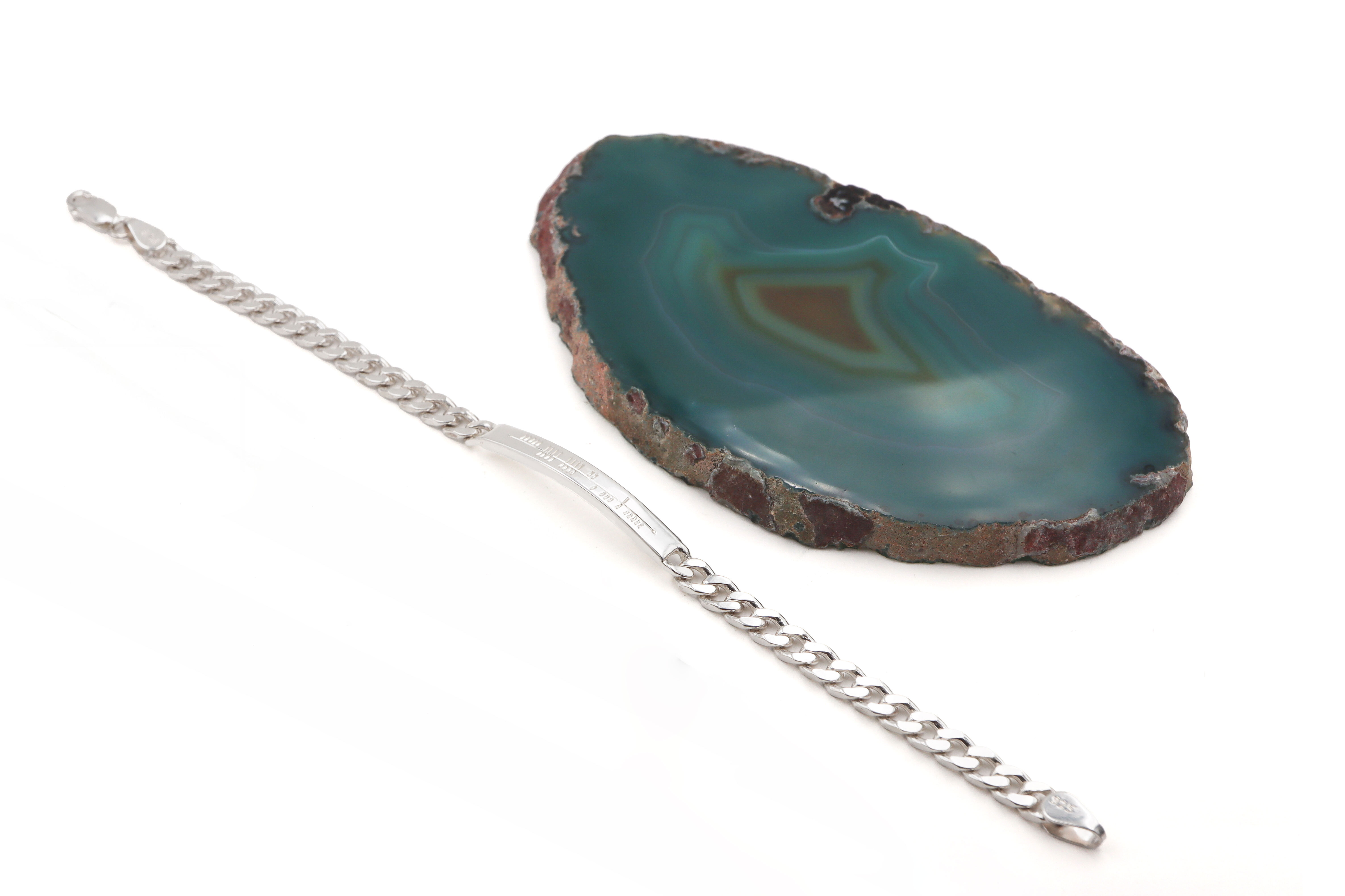 Womens Ogham Bracelet in Sterling Silver. Pictured Flat.