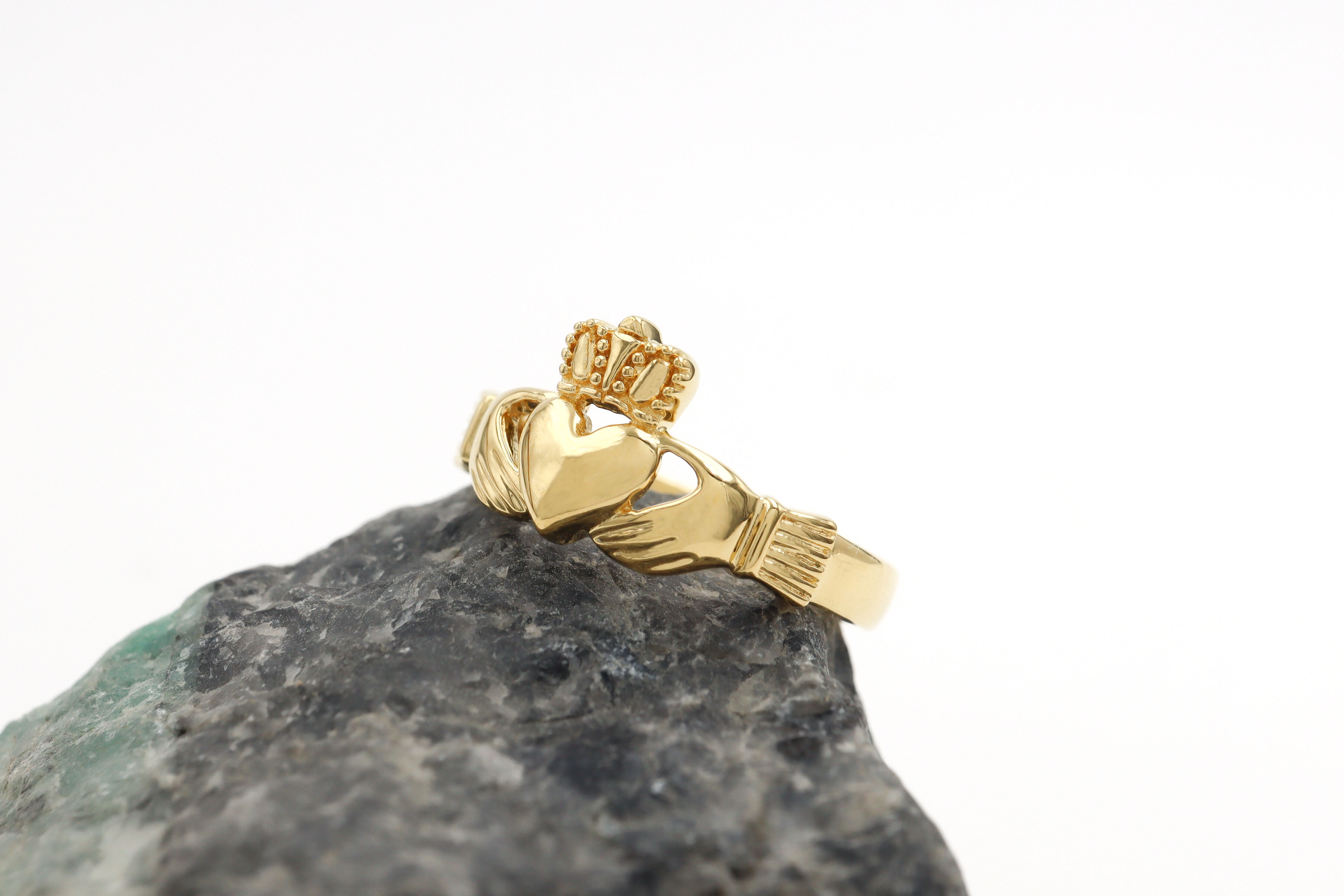Ladies Gold Vermeil Claddagh Ring Sku 25198 on rock