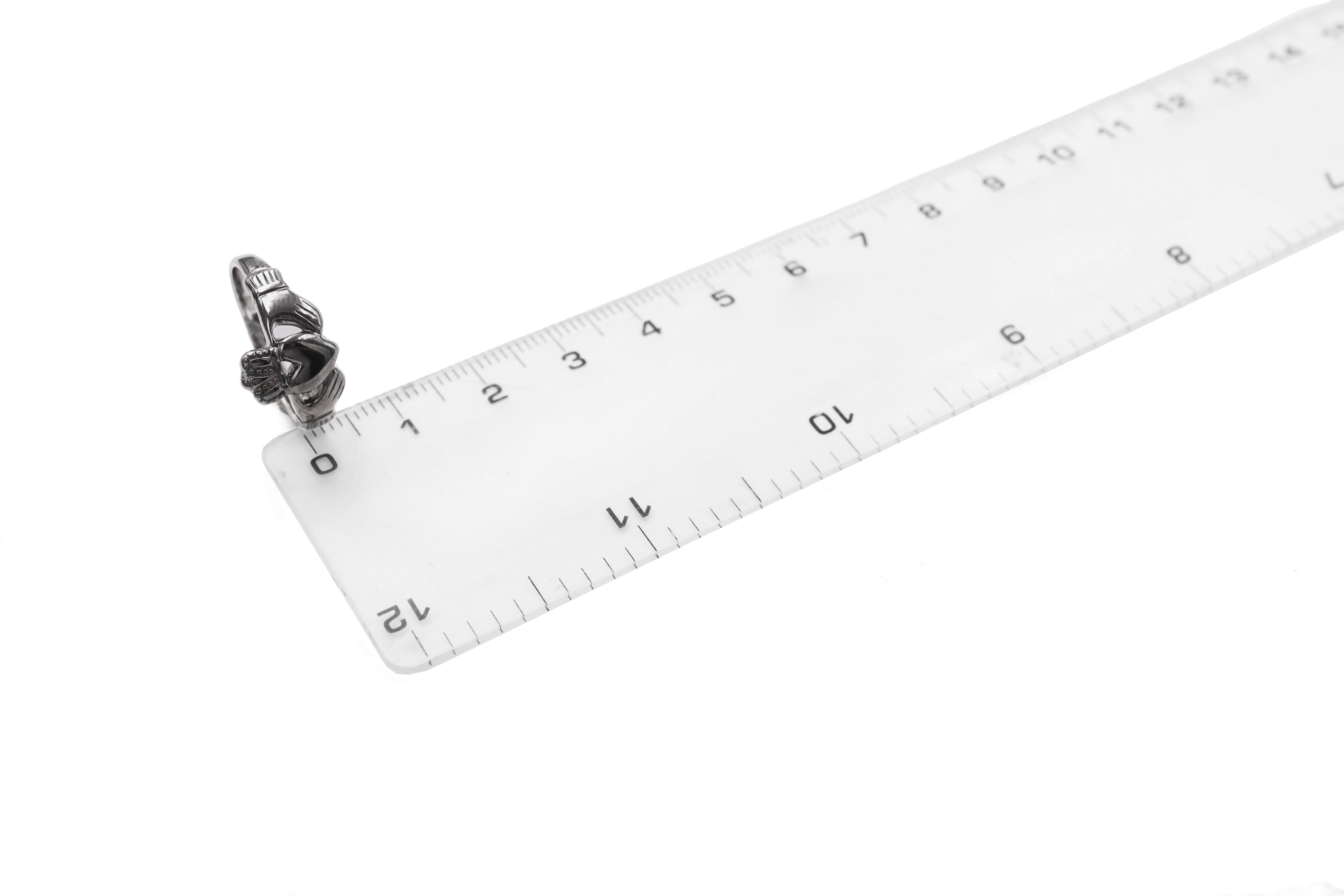 Womens Black Rhodium Claddagh 3.0mm Ring in Real White Gold. Picture For Scale.