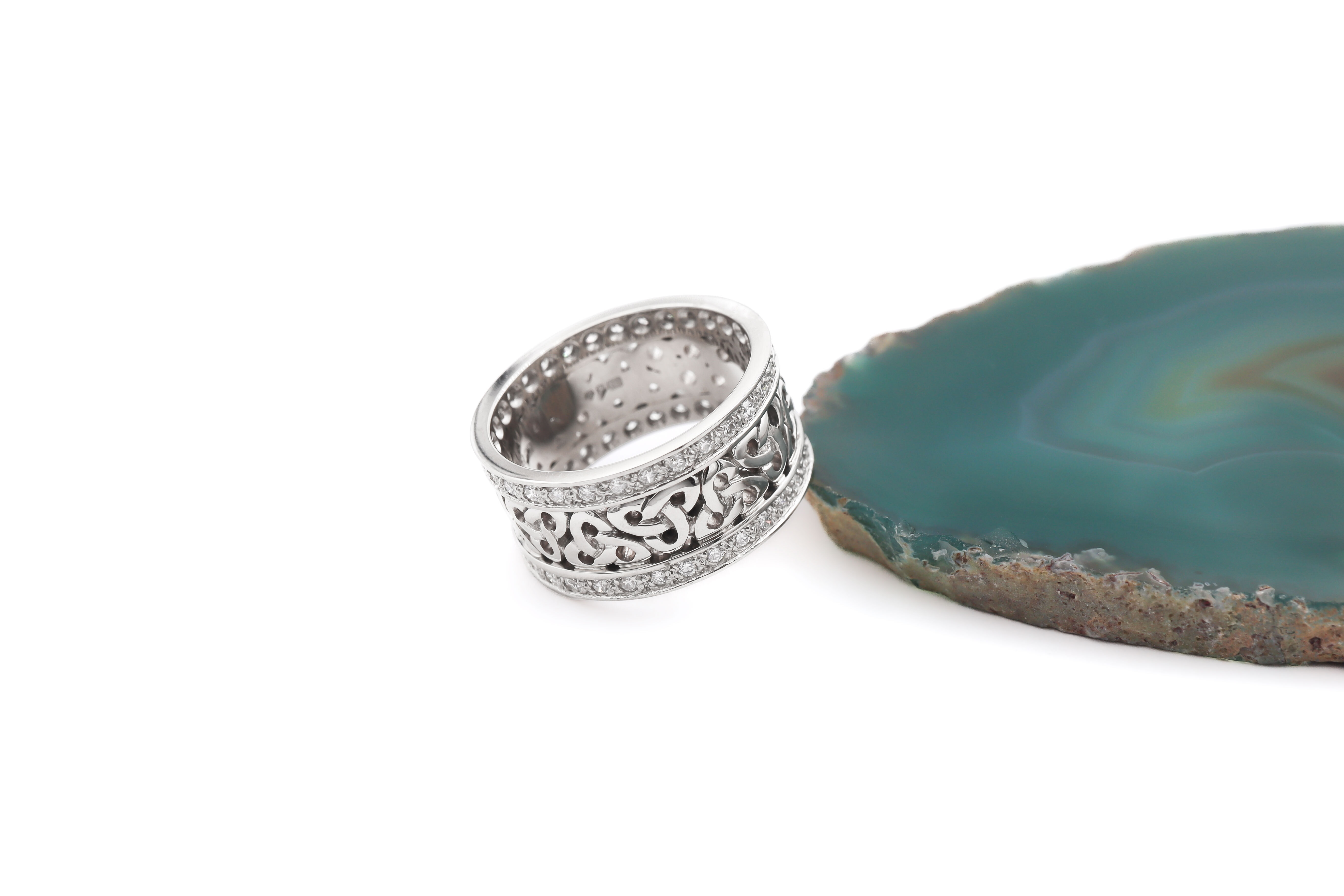 Trinity Knot 10.0mm Ring in Platinum With a Polished Finish. Side View.