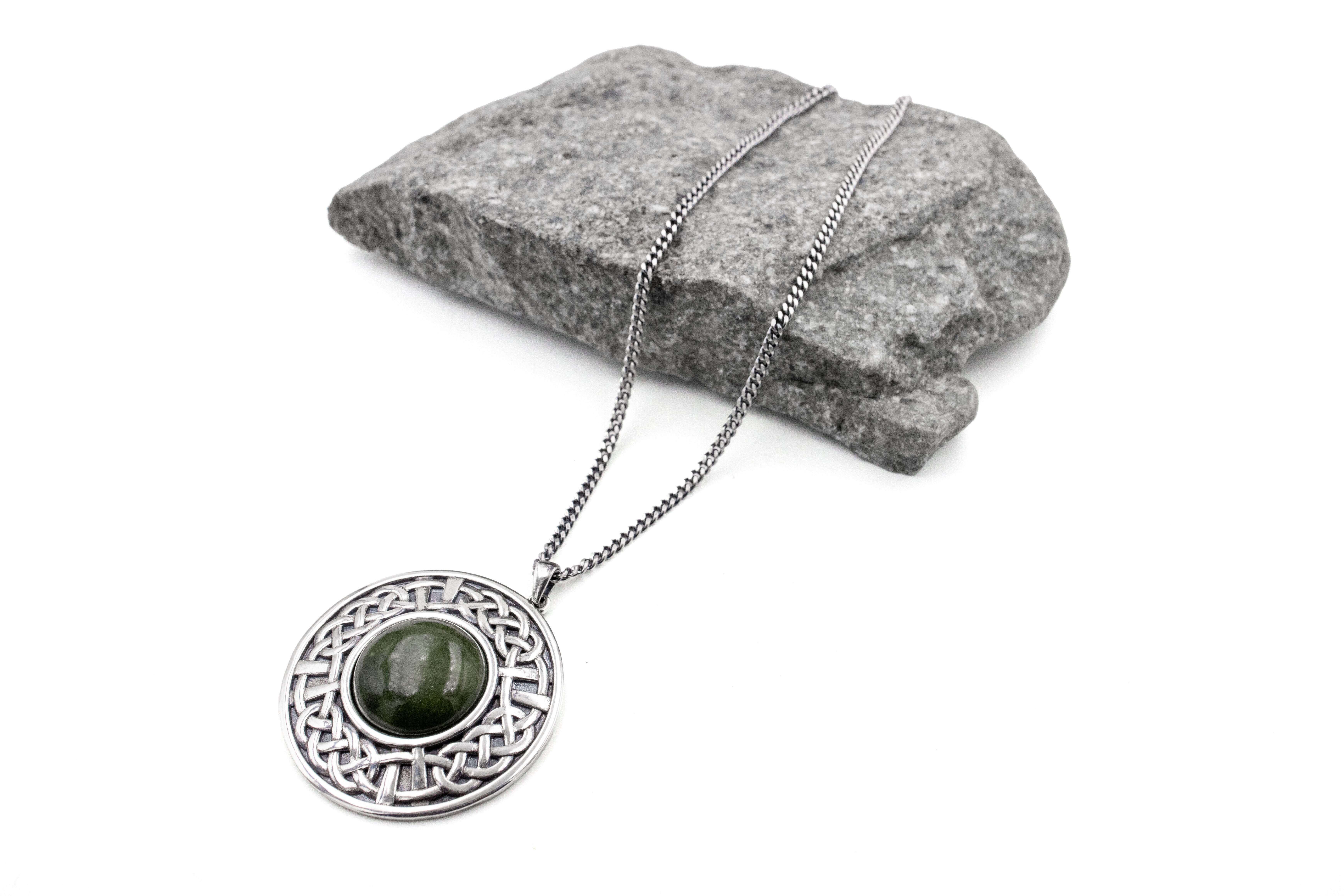 Authentic Sterling Silver Connemara Marble & Celtic Knot & Medals and Medallions Necklace With a Oxidized Finish For Women. Pictured Flat.