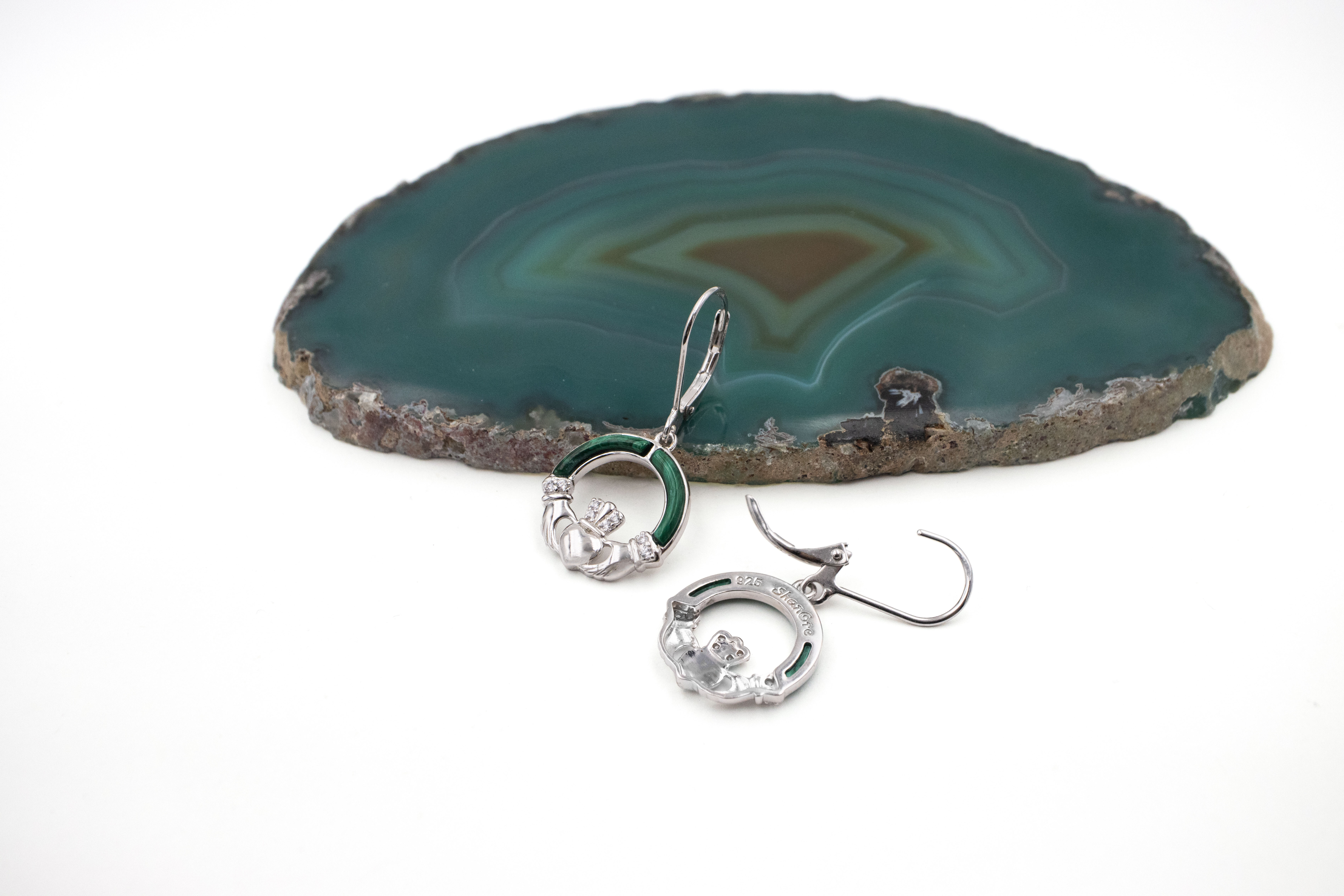 Authentic Sterling Silver Claddagh Earrings For Women With a Polished Finish. Picture Of The Back.