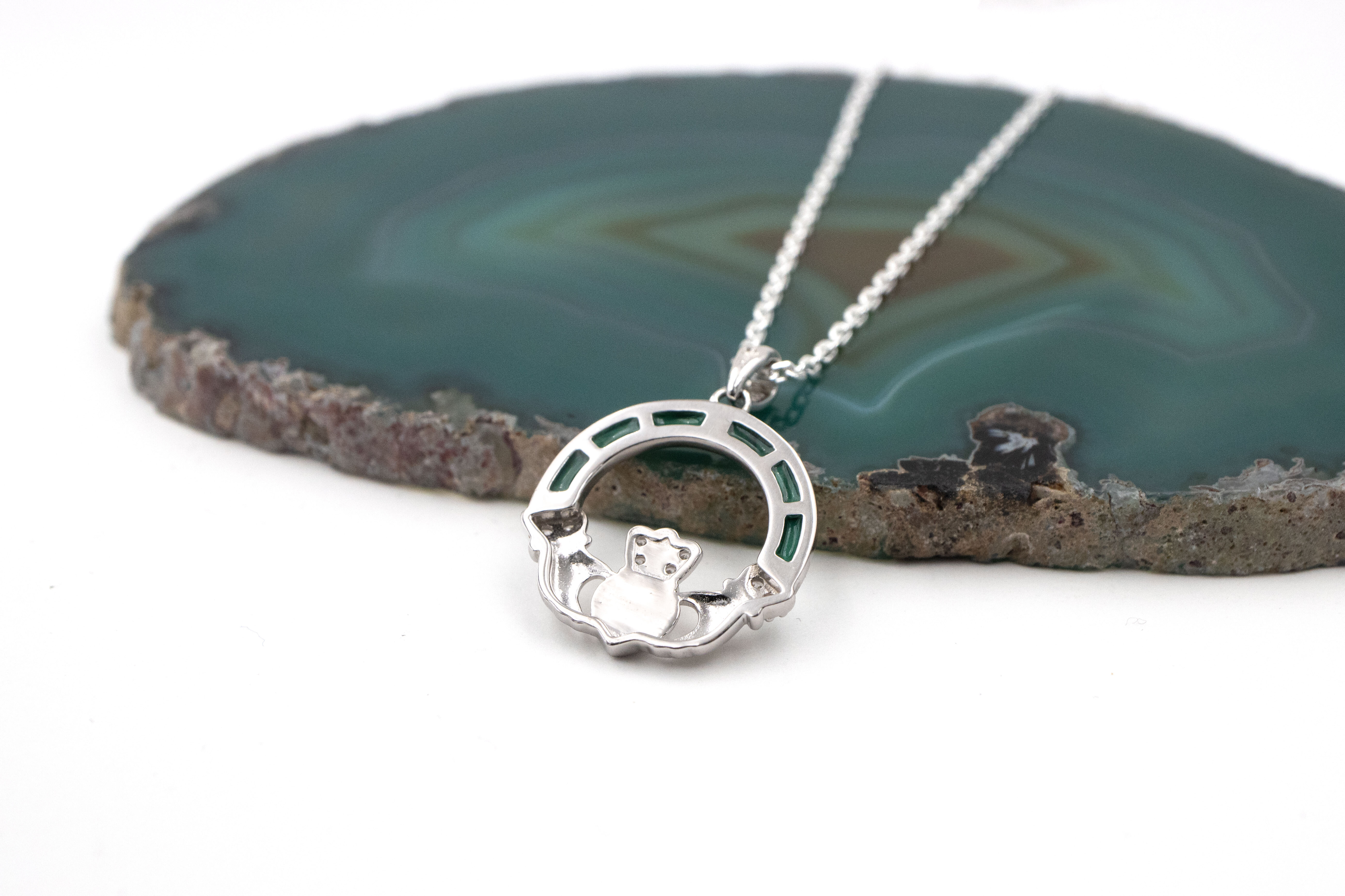 Womens Claddagh Necklace in Sterling Silver With a Polished Finish. Picture Of The Back.
