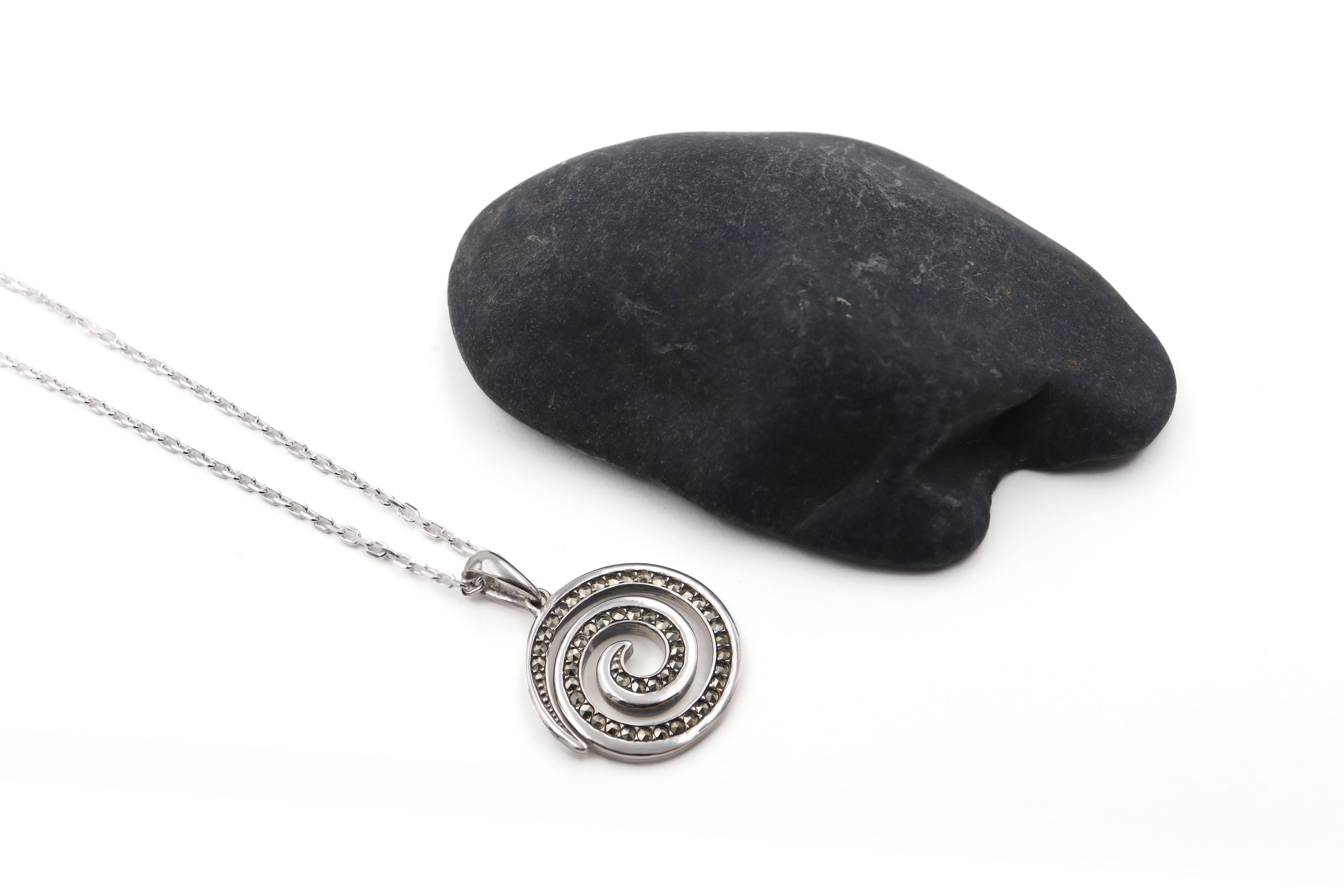 Genuine Sterling Silver Triskele & Newgrange Necklace For Women. Pictured Flat.
