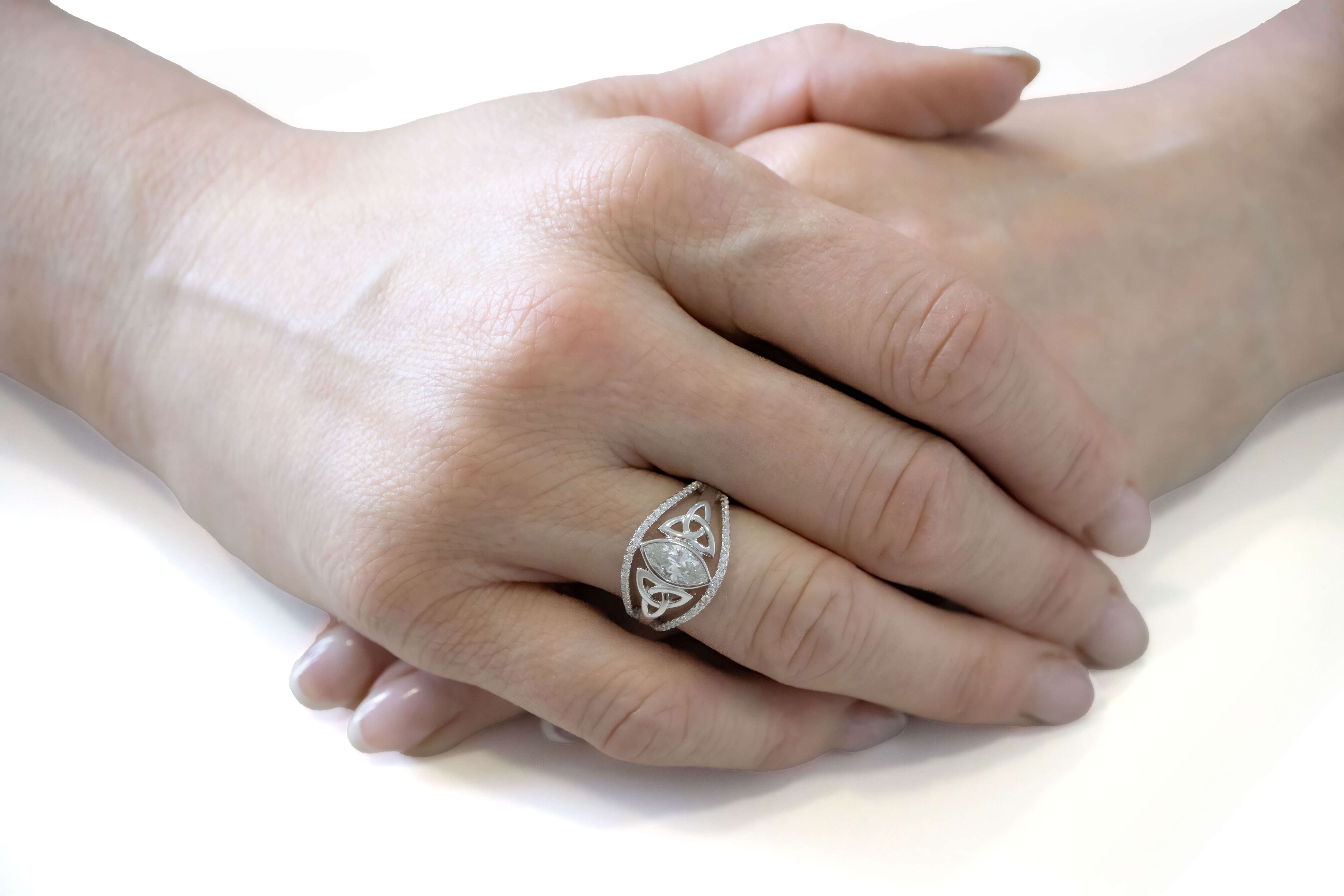 Gorgeous Sterling Silver Trinity Knot Ring For Women With a Polished Finish - Model Photo