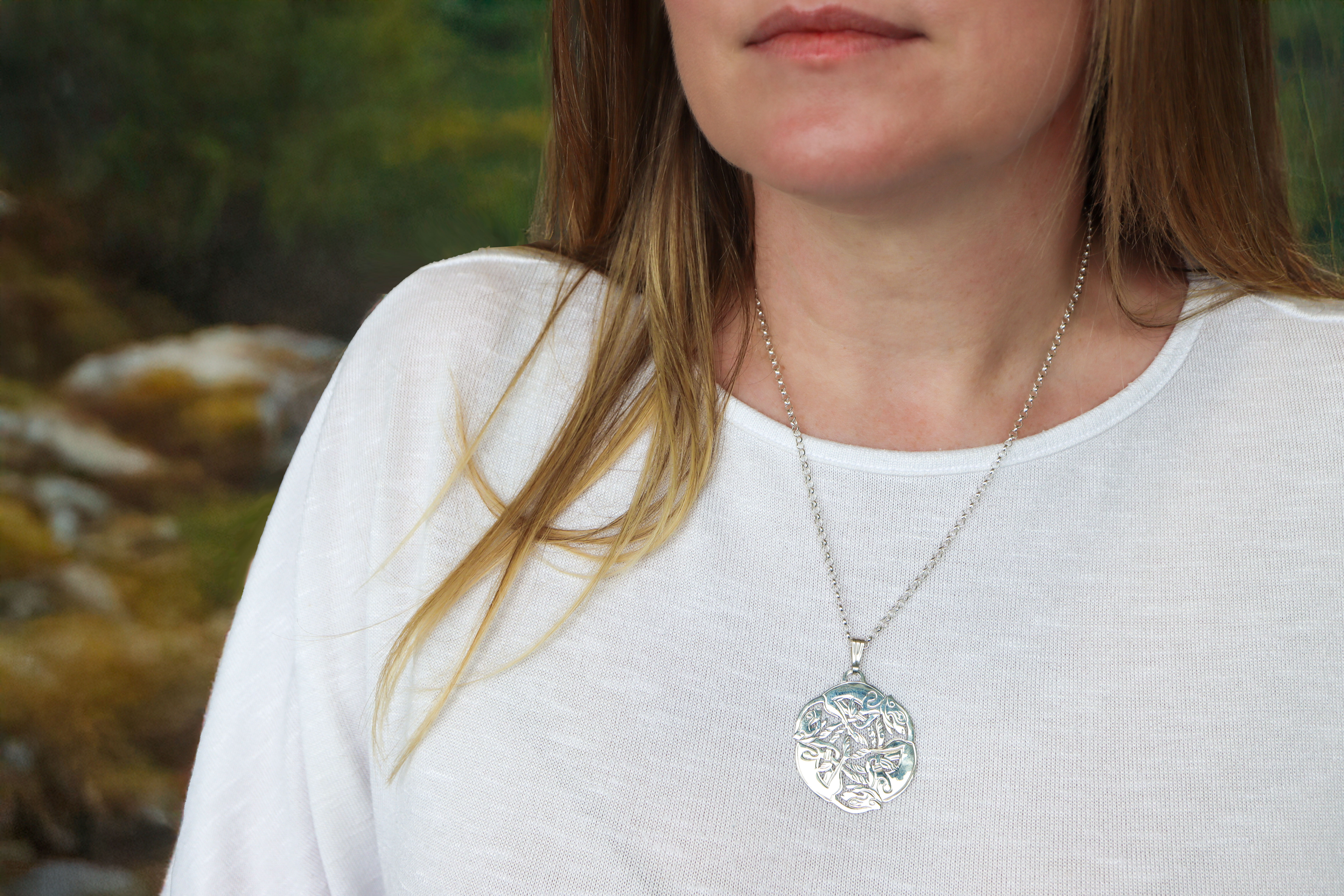 Medium Sized Attractive Sterling Silver Book of Kells Necklace For Women - Model Photo