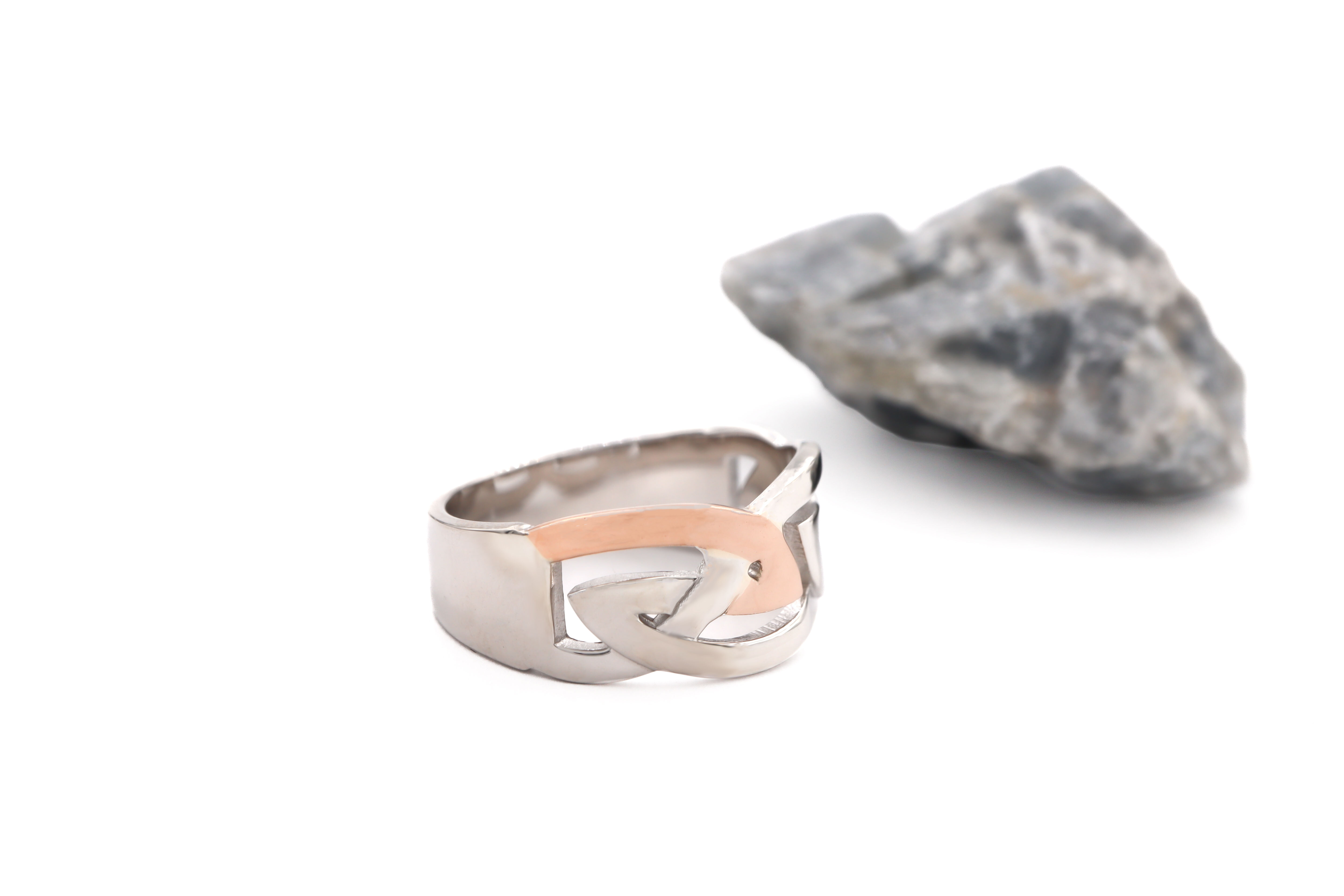 Mens Celtic Knot & Irish Gold Ring in Sterling Silver & 10K Rose Gold With a Polished Finish. Side View.