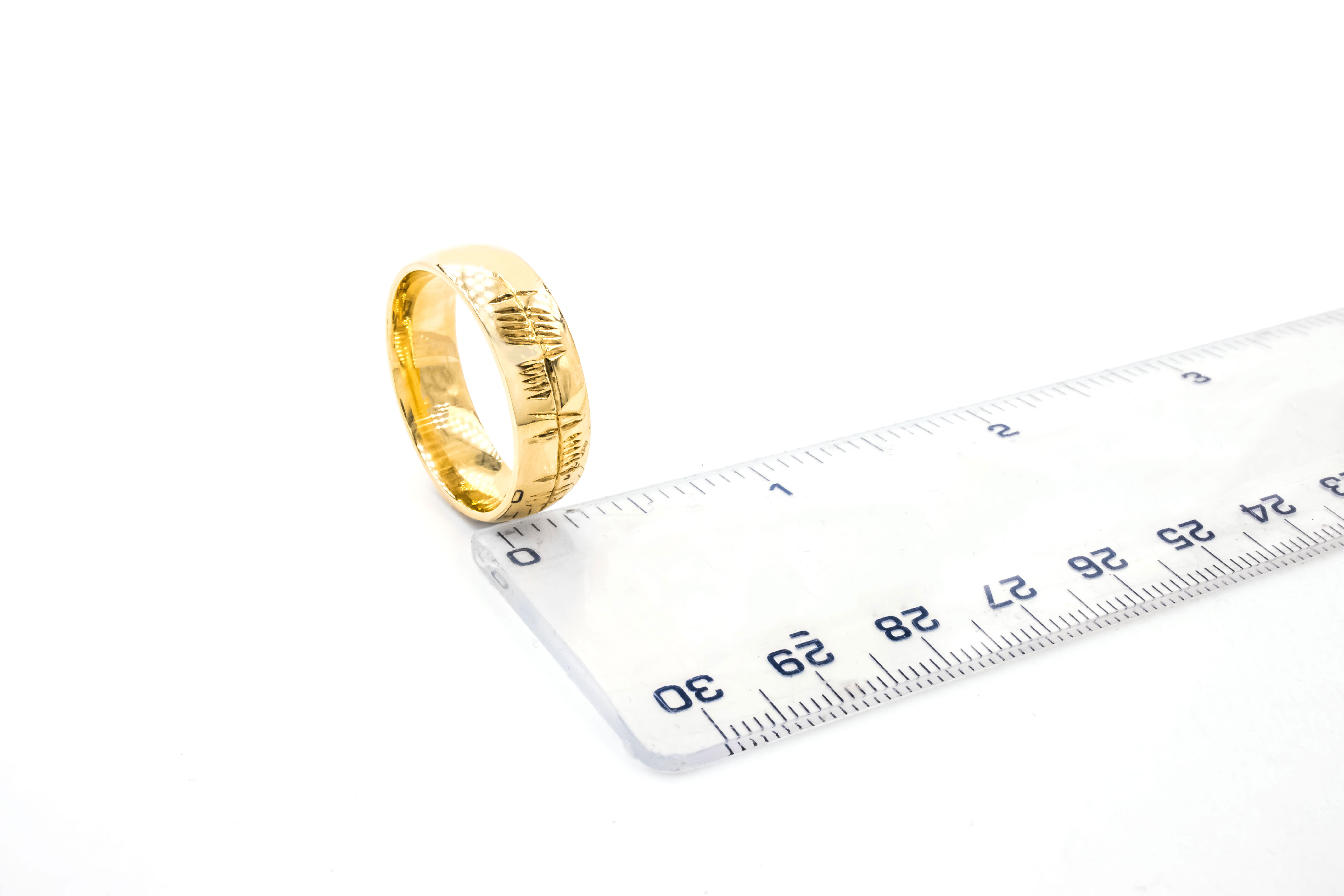 Attractive 18K Yellow Gold Ogham Ring With a Polished Finish