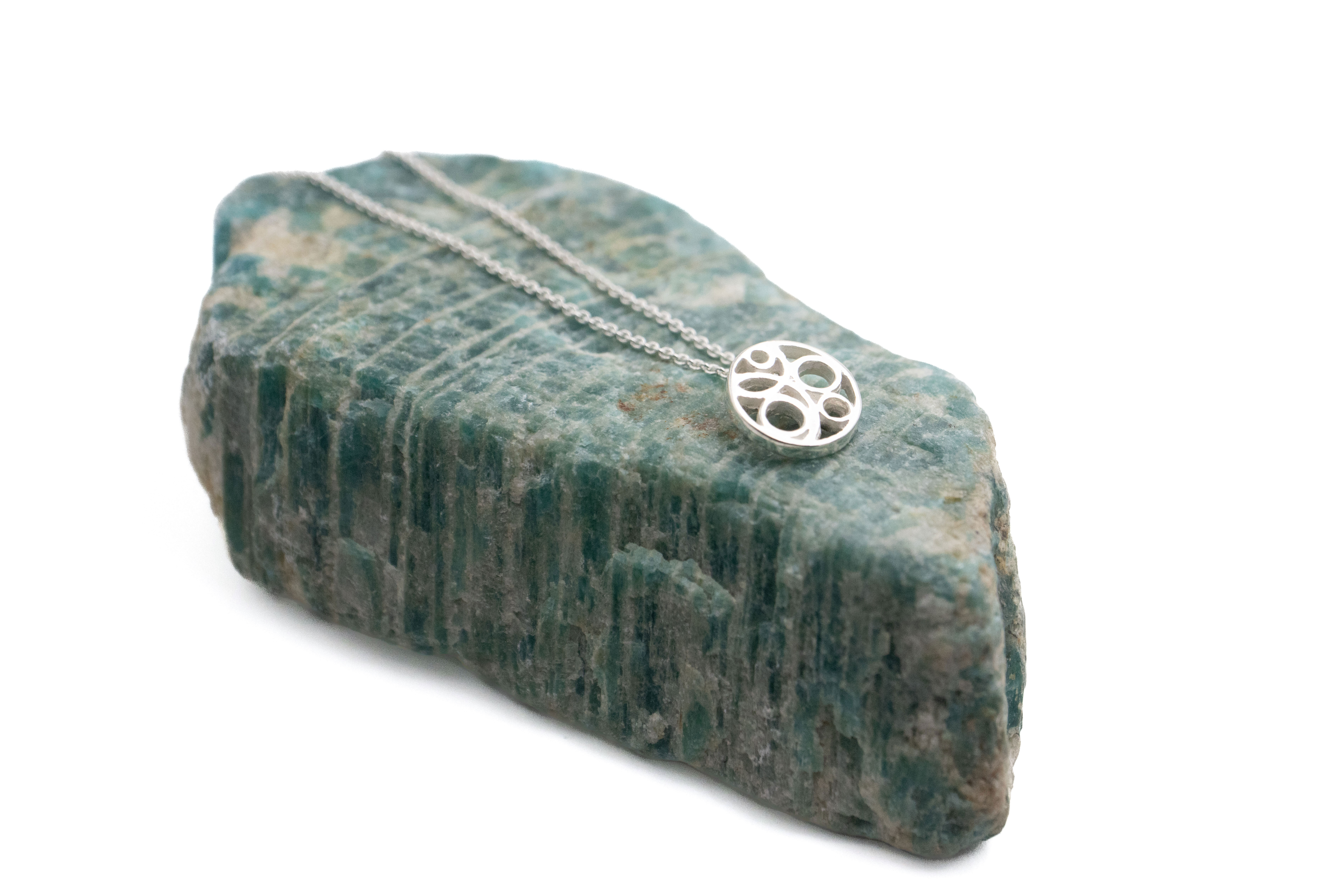 Womens Small Polished Sterling Silver Folklore & Triskele & Newgrange Necklace. Pictured Flat.