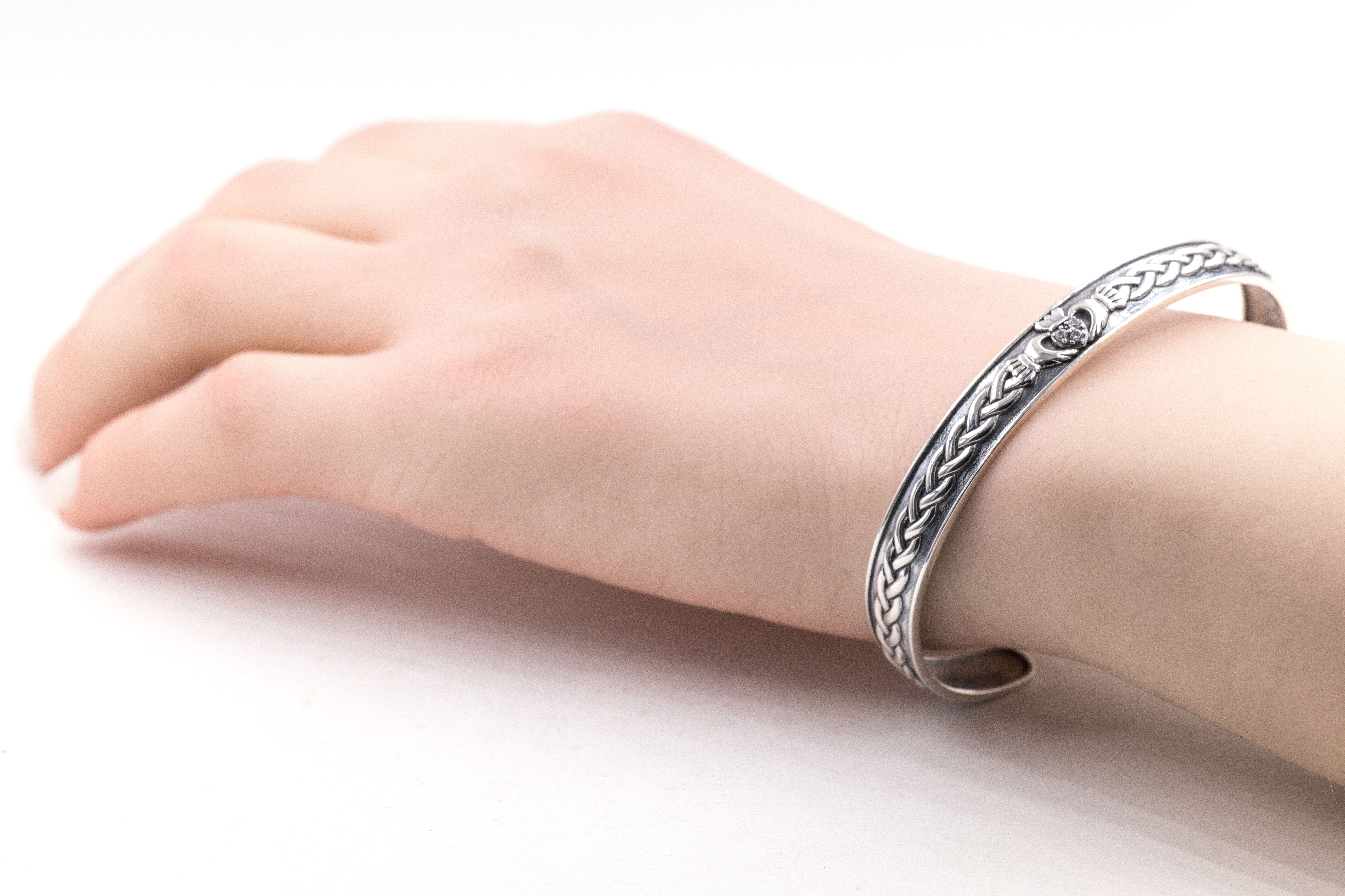 Attractive Sterling Silver Claddagh Bracelet With a Oxidized Finish For Women - Model Photo