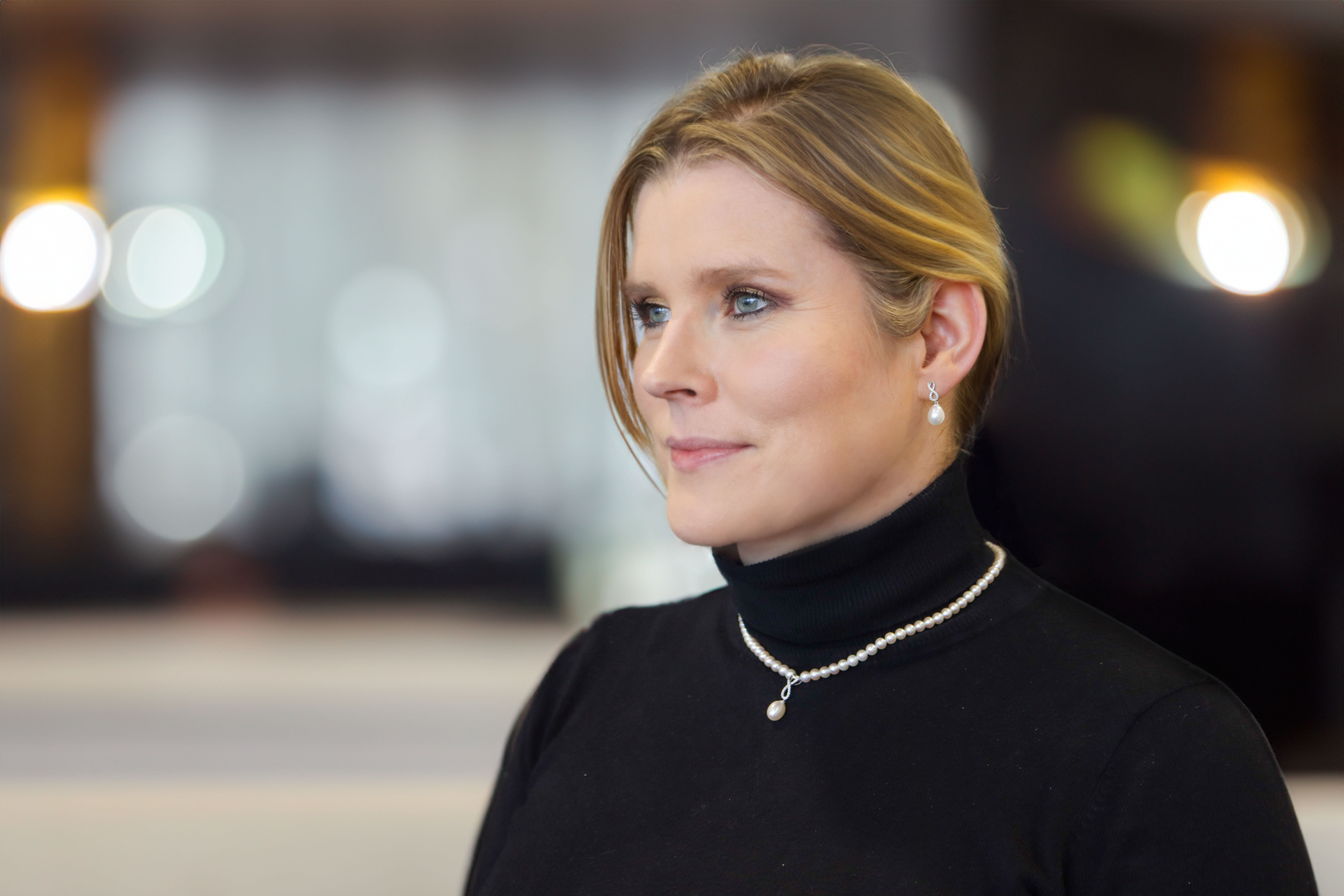 Womens Polished White Gold Celtic Knot Necklace - Model Photo