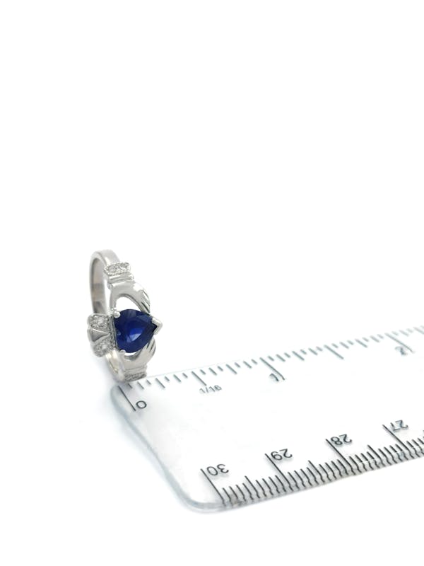 Womens Claddagh 1.24ct Natural Sapphire Engagement Ring in Platinum 950. Picture For Scale.