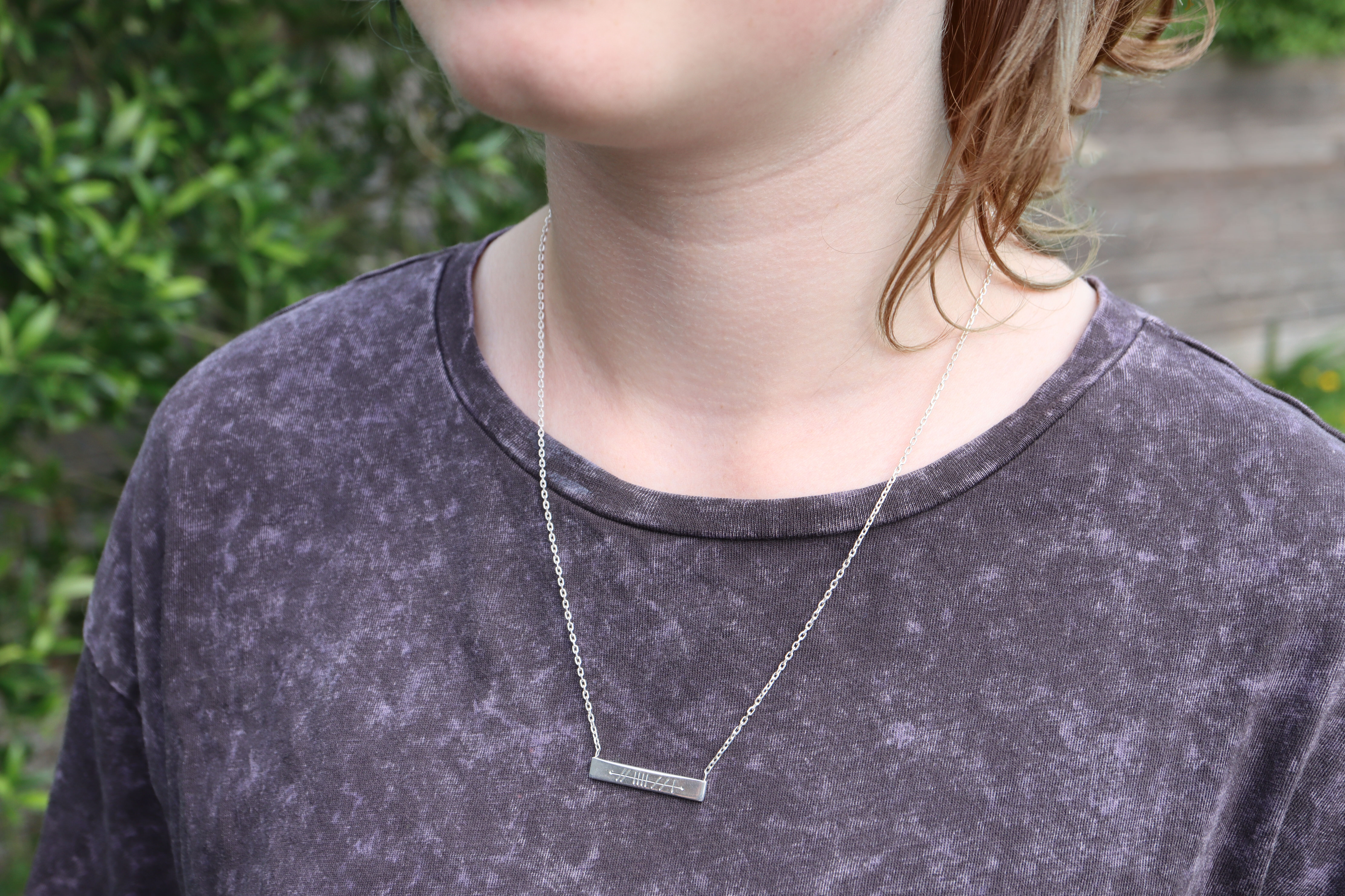 Rectangle Ogham Necklace kids model