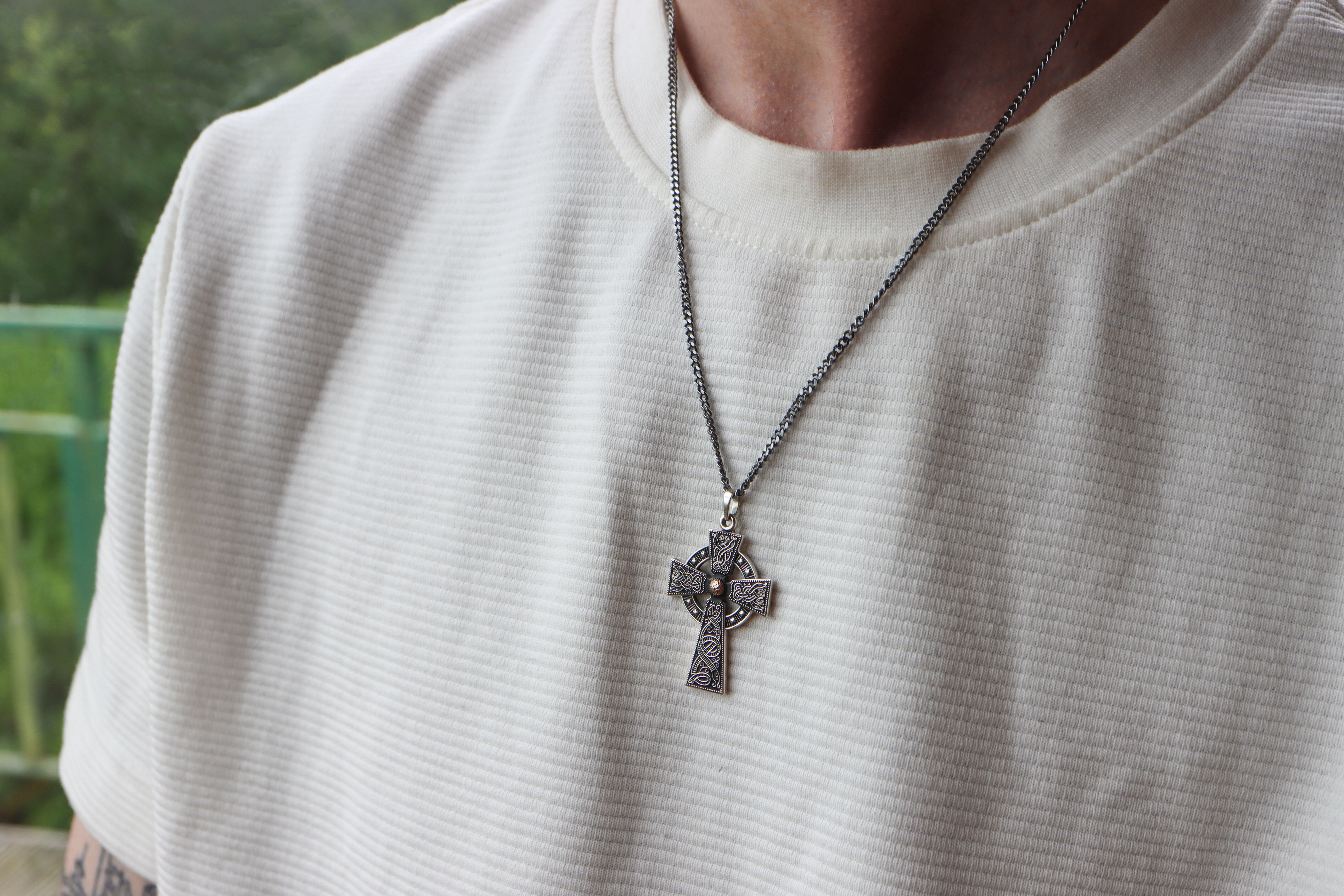 Striking Sterling Silver & Rose Gold Celtic Cross Necklace With a Oxidized Finish - Model Photo