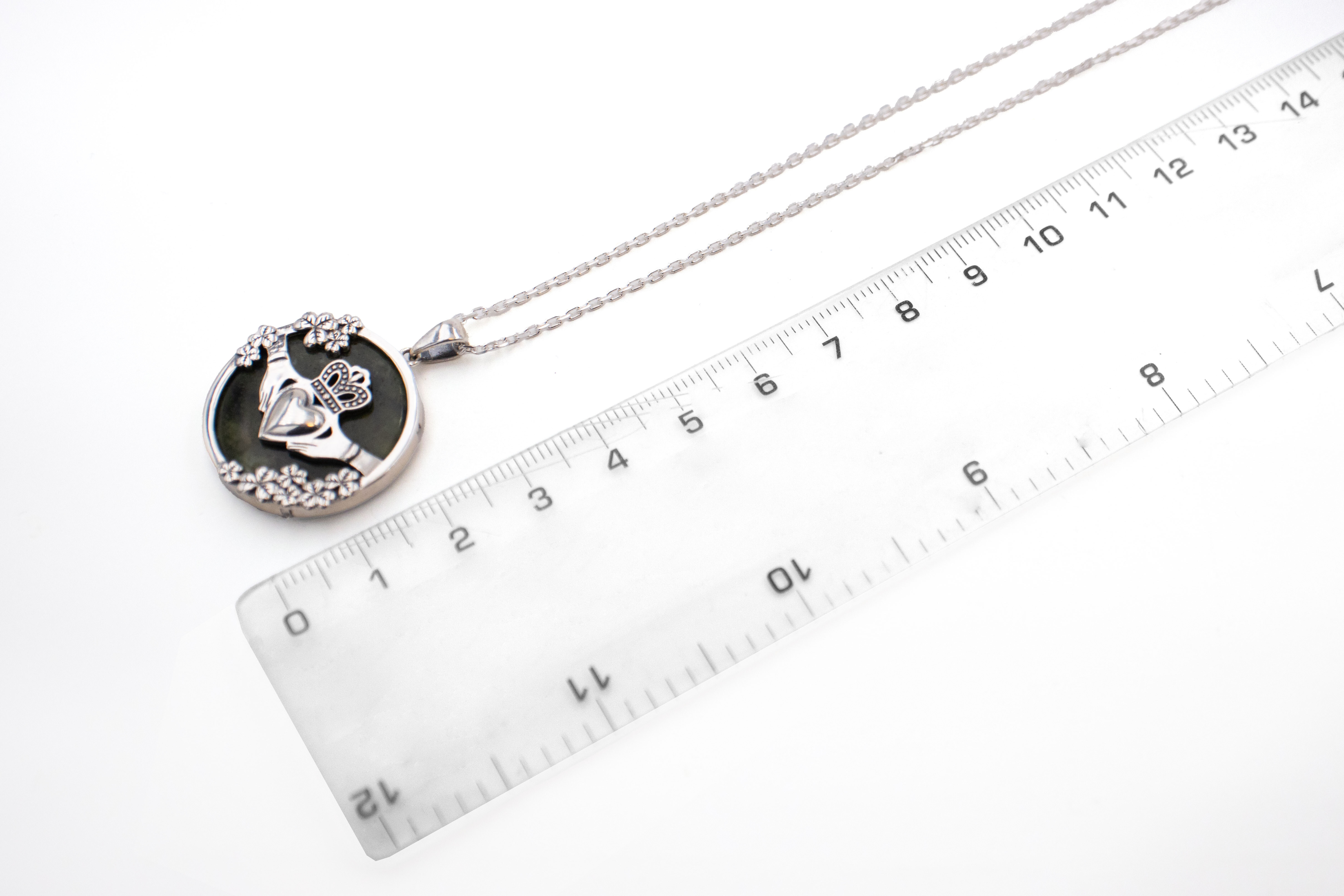 Womens Polished Claddagh Necklace in Real Sterling Silver. Picture For Scale.