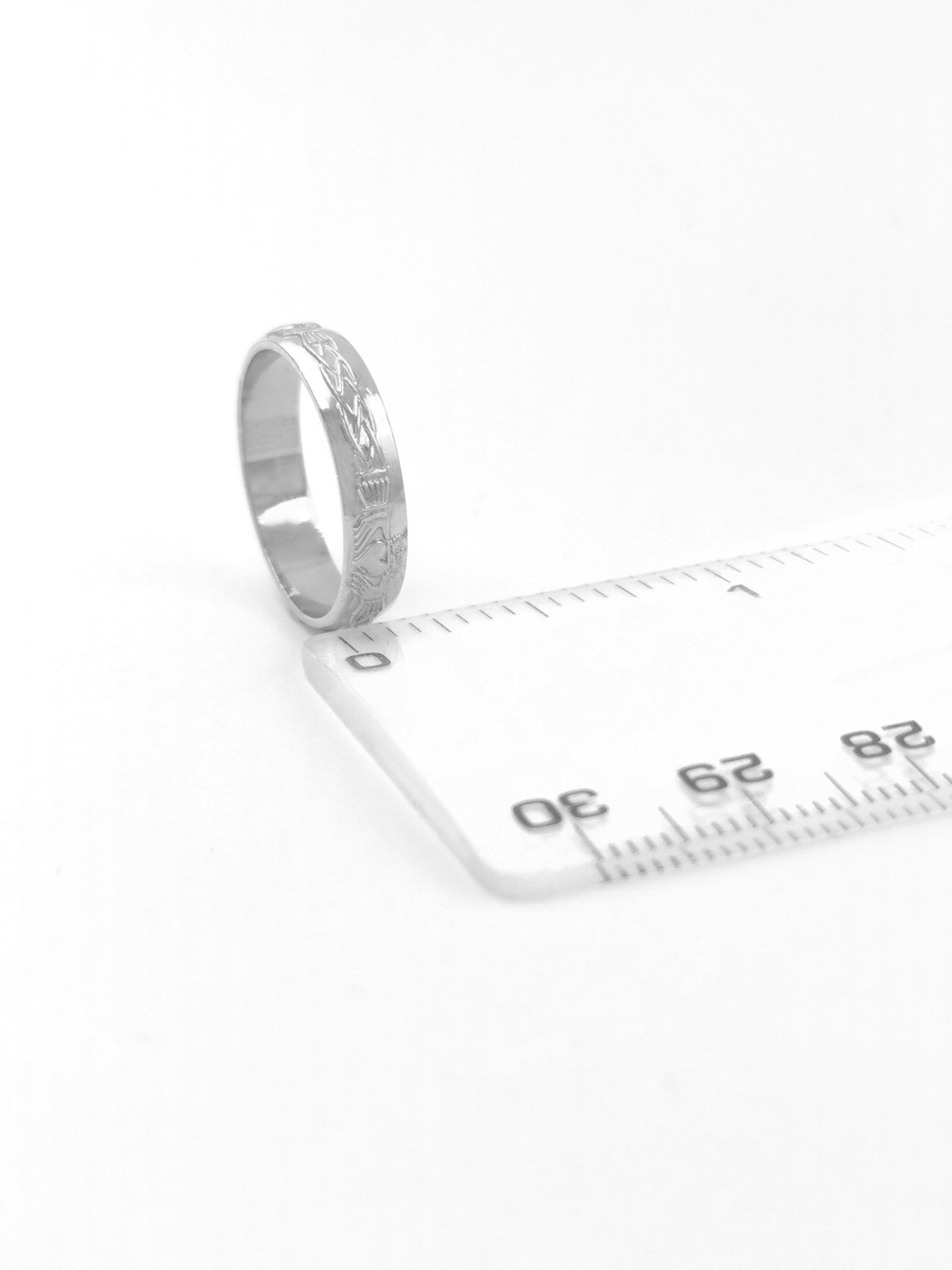 Striking Sterling Silver Claddagh & Celtic Knot Wedding Ring For Women. Picture For Scale.