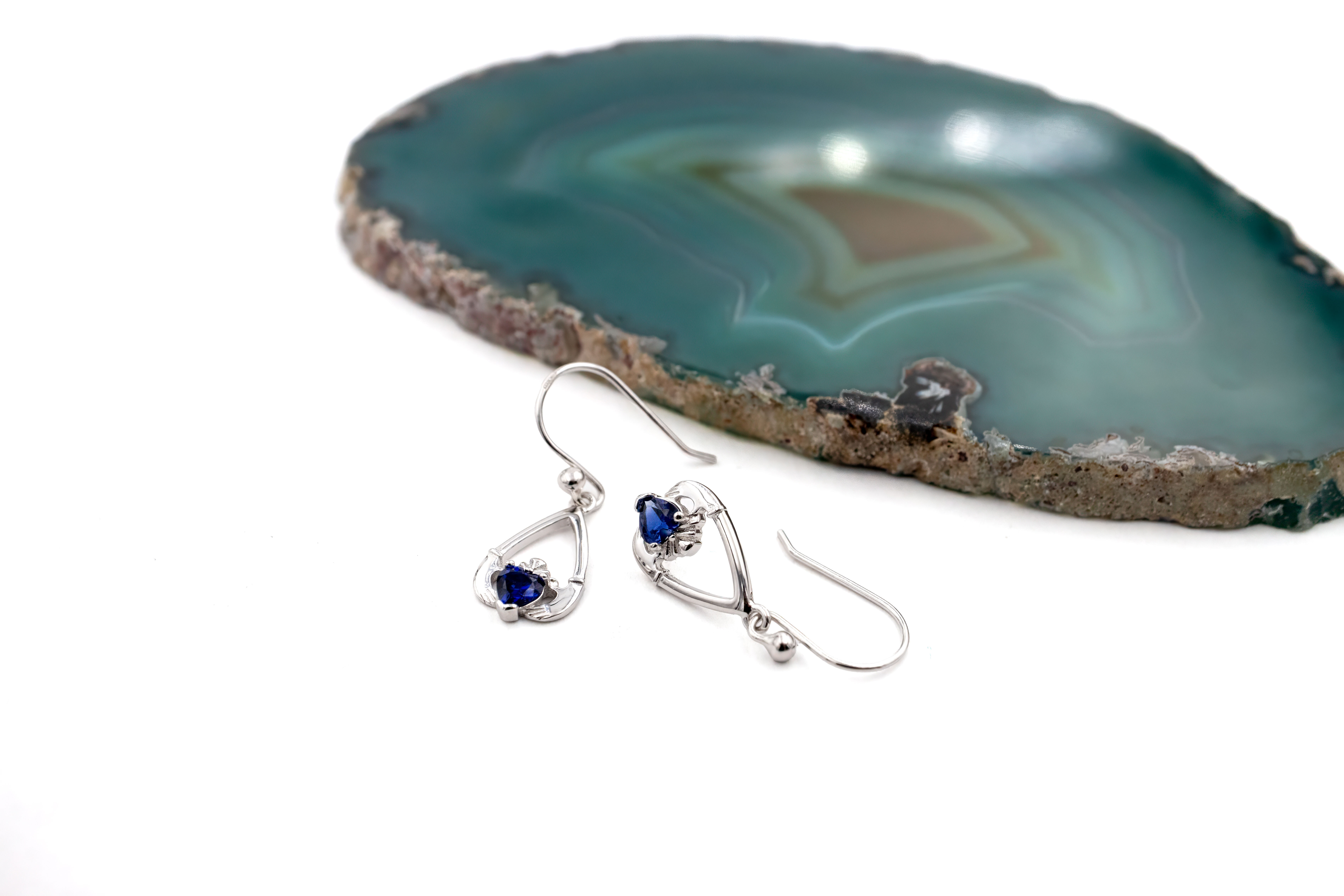 Striking Sterling Silver September Birthstone Earrings For Women. Side View.