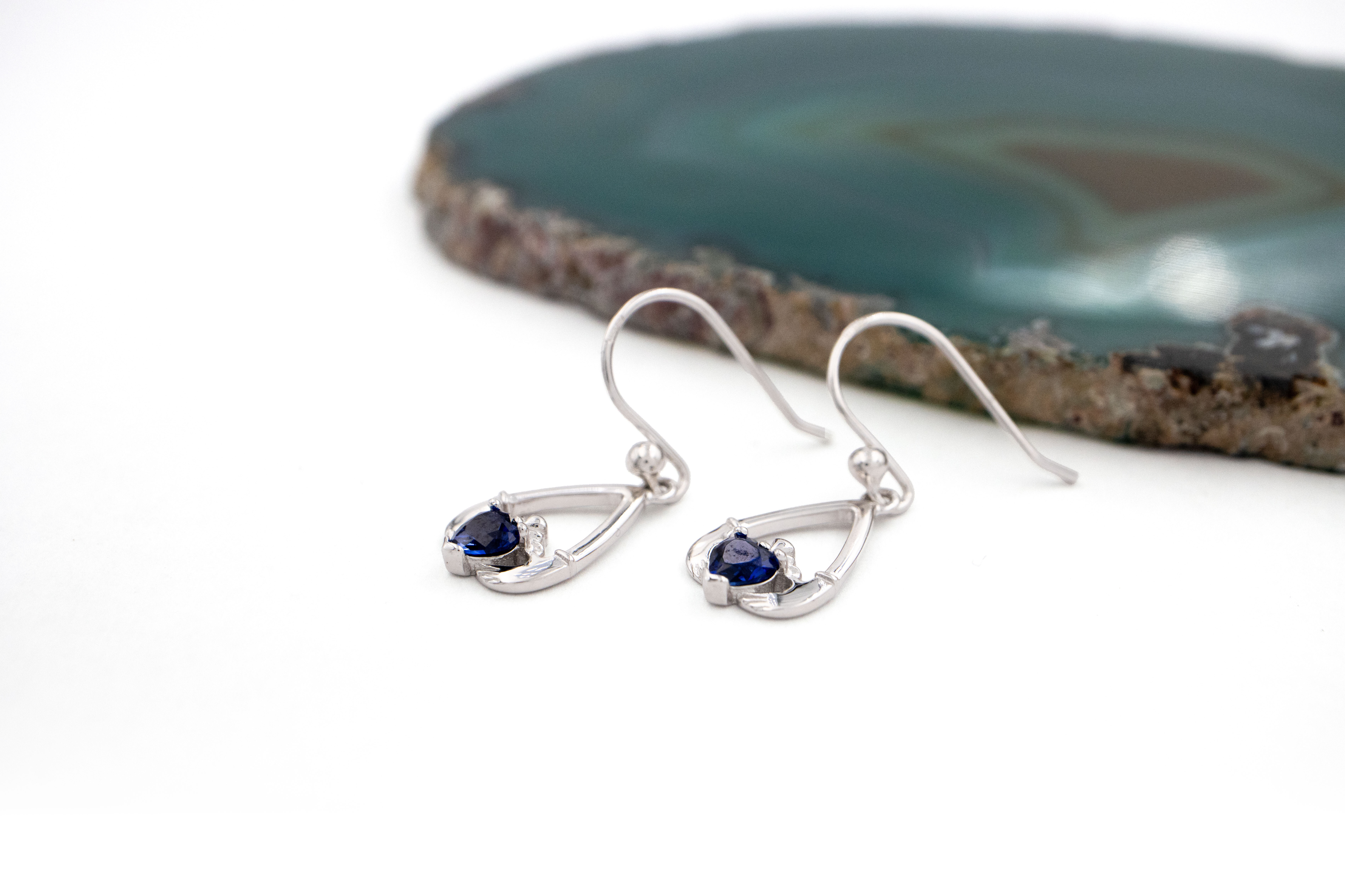 Womens September Birthstone Earrings in Sterling Silver. Side View.