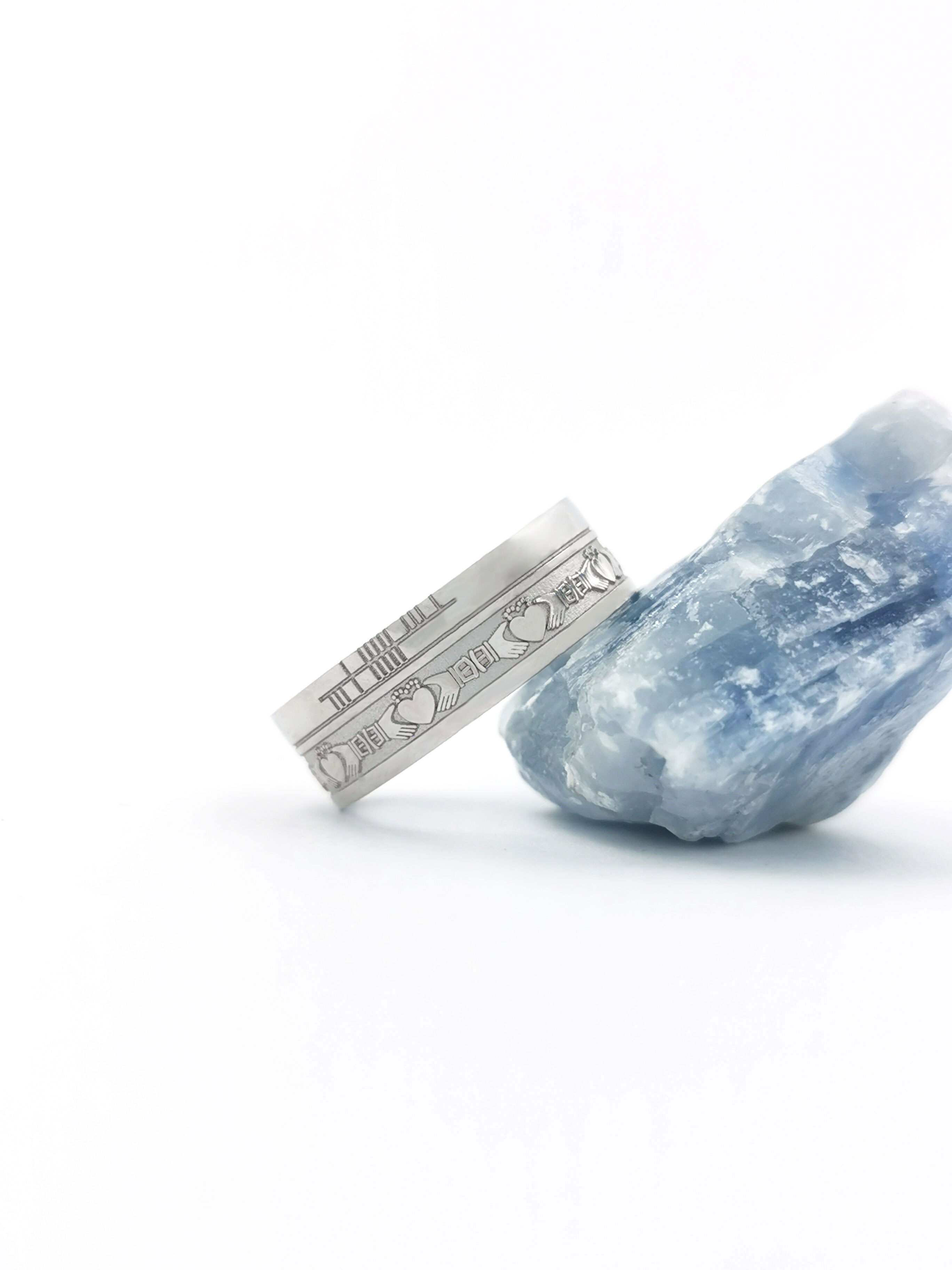 Striking Platinum 950 Ogham & Claddagh 5.2mm Ring With a Florentine Finish