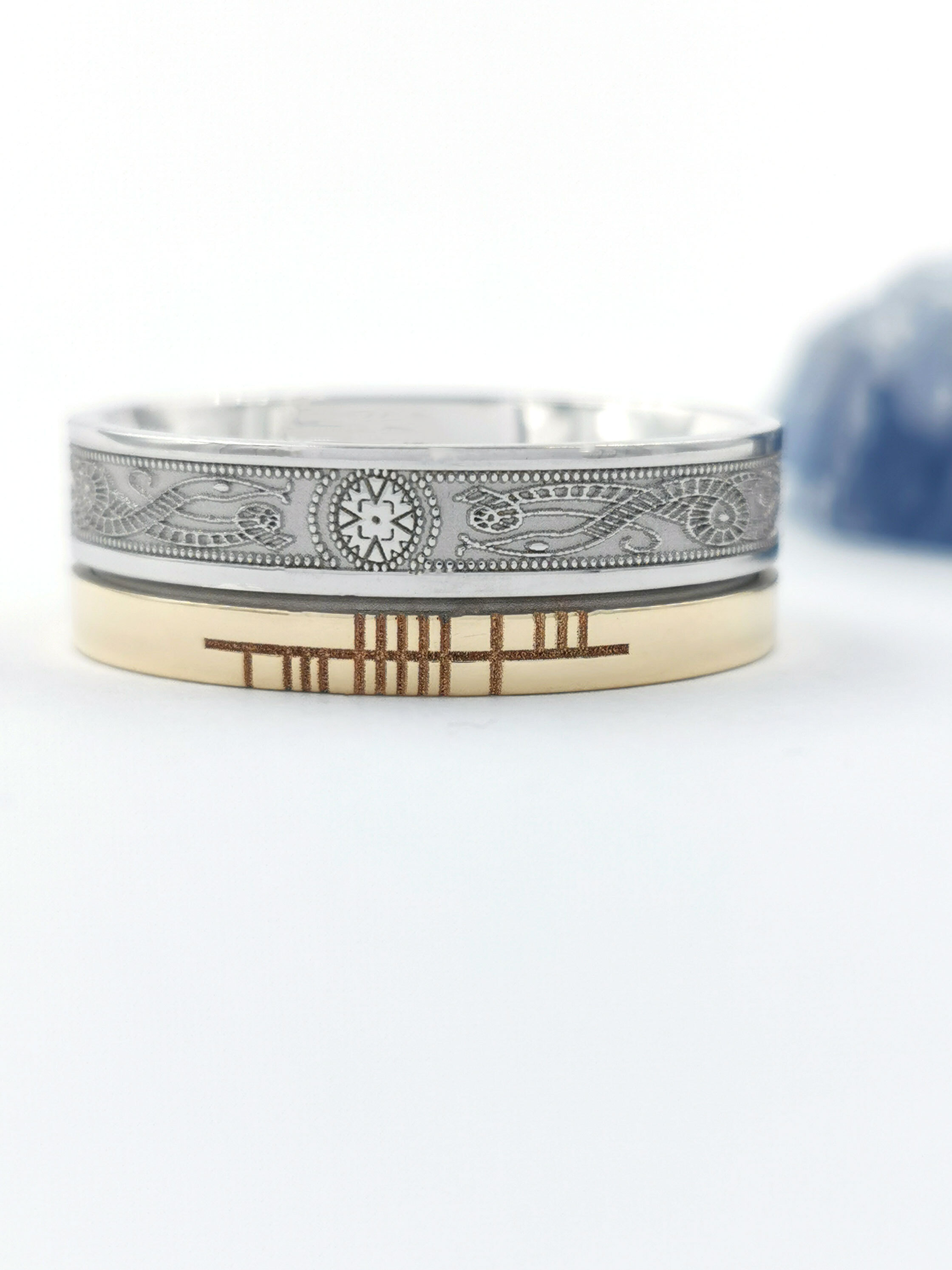 Florentine Ogham Personalizable 7.3mm Ring in Real White Gold & Yellow Gold. Pictured Flat.