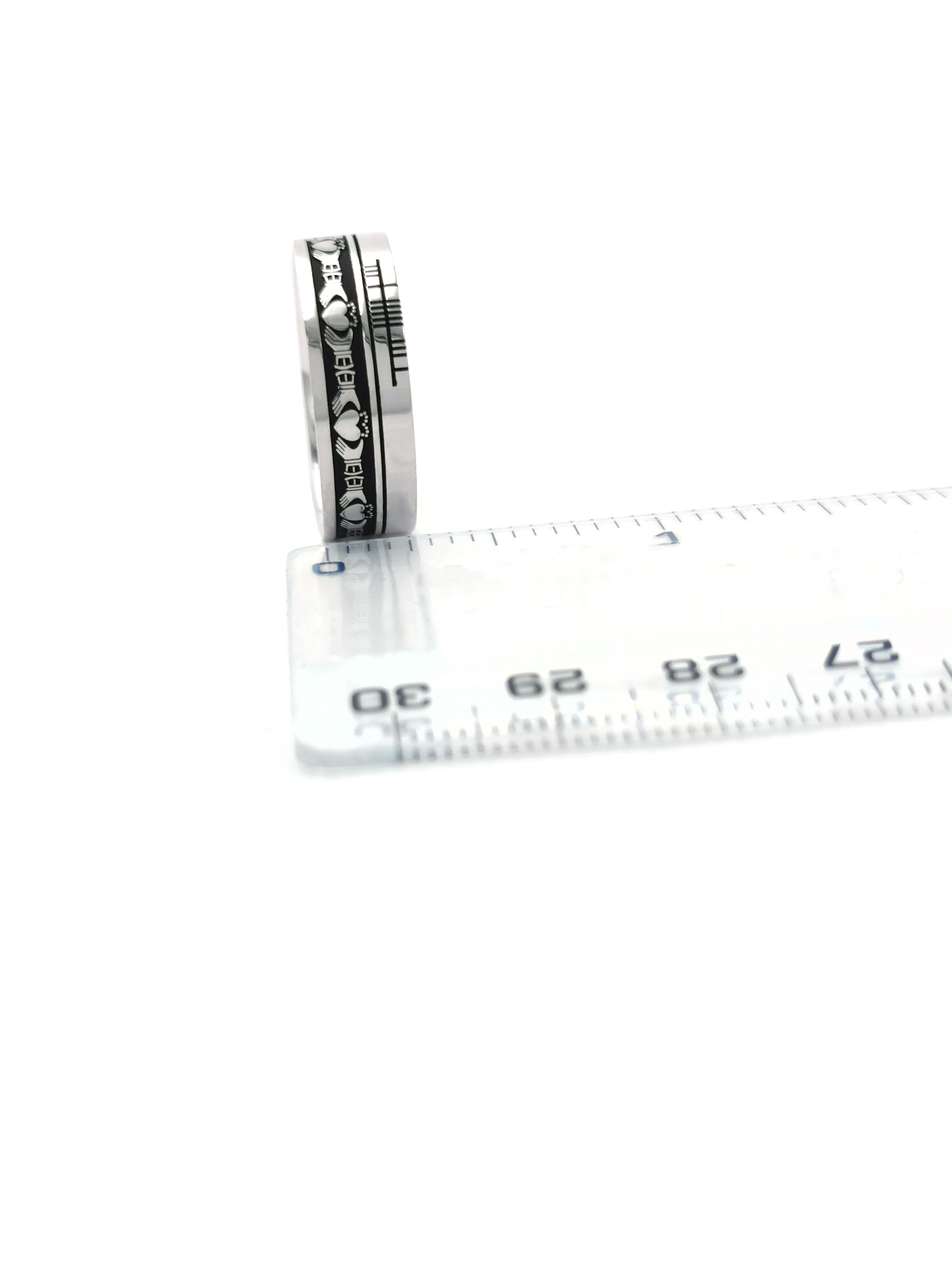 Ogham 7.3mm Ring in Sterling Silver With a Oxidized Finish. Picture For Scale.