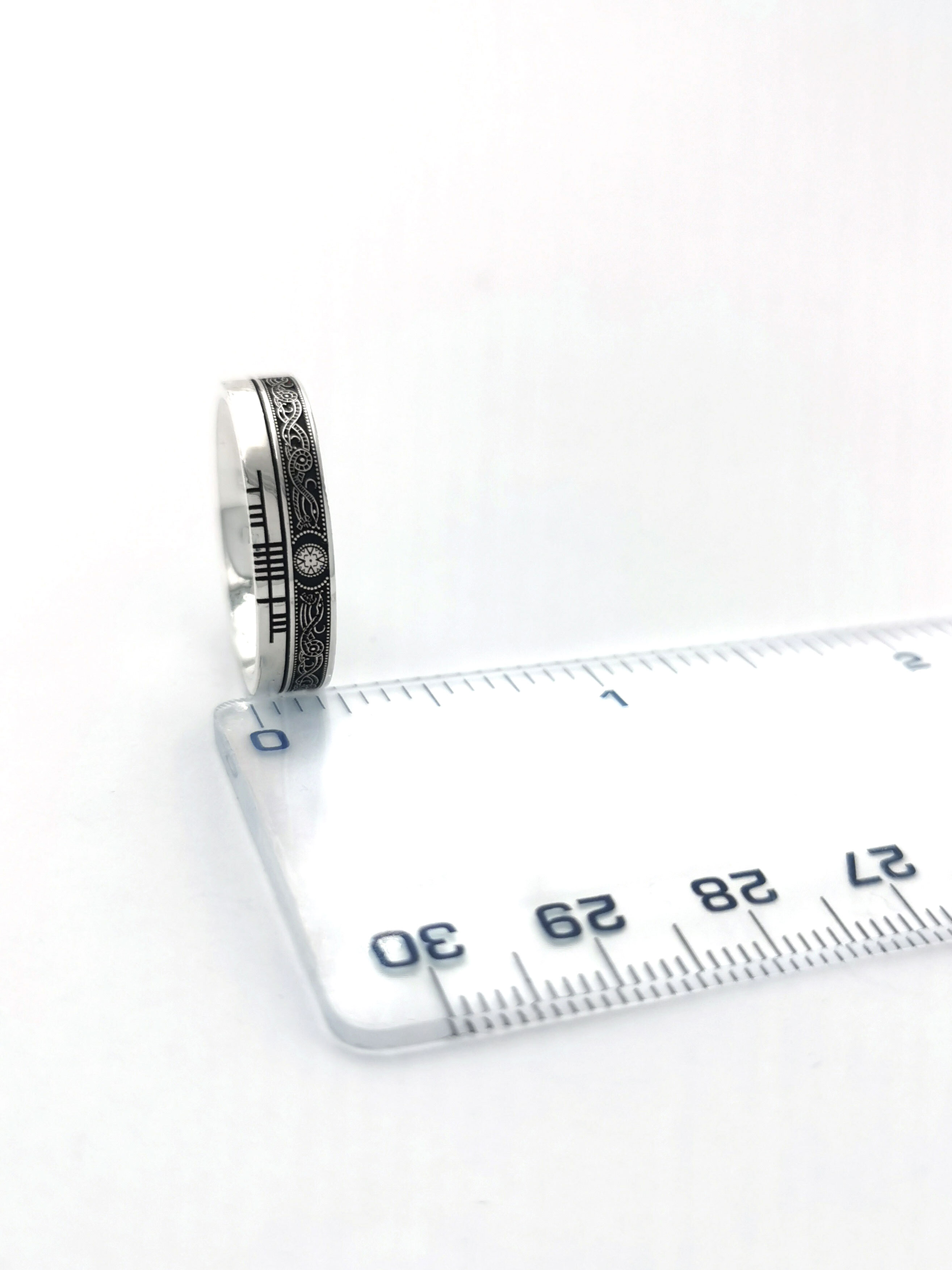 Striking Sterling Silver Ogham Wedding Ring With a Oxidized Finish. Picture For Scale.